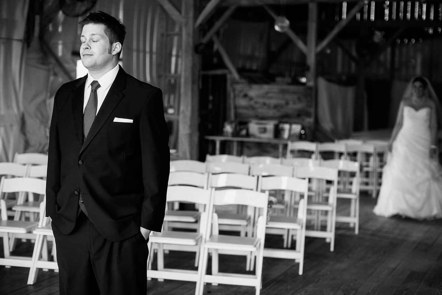 bride and groom first look at the Enchanted Barn in Hillsdale 