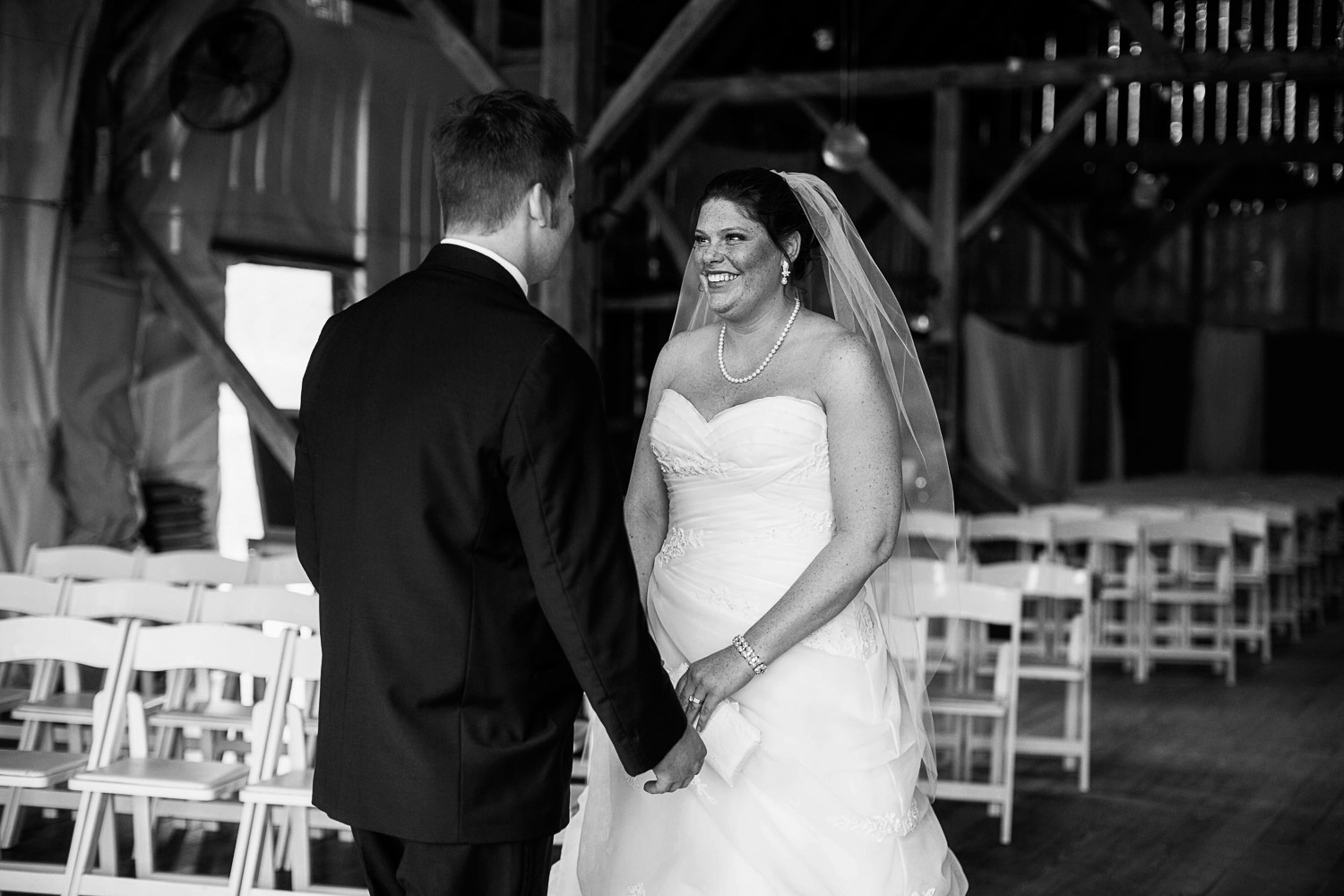 first look on their wedding day at the Enchanted Barn