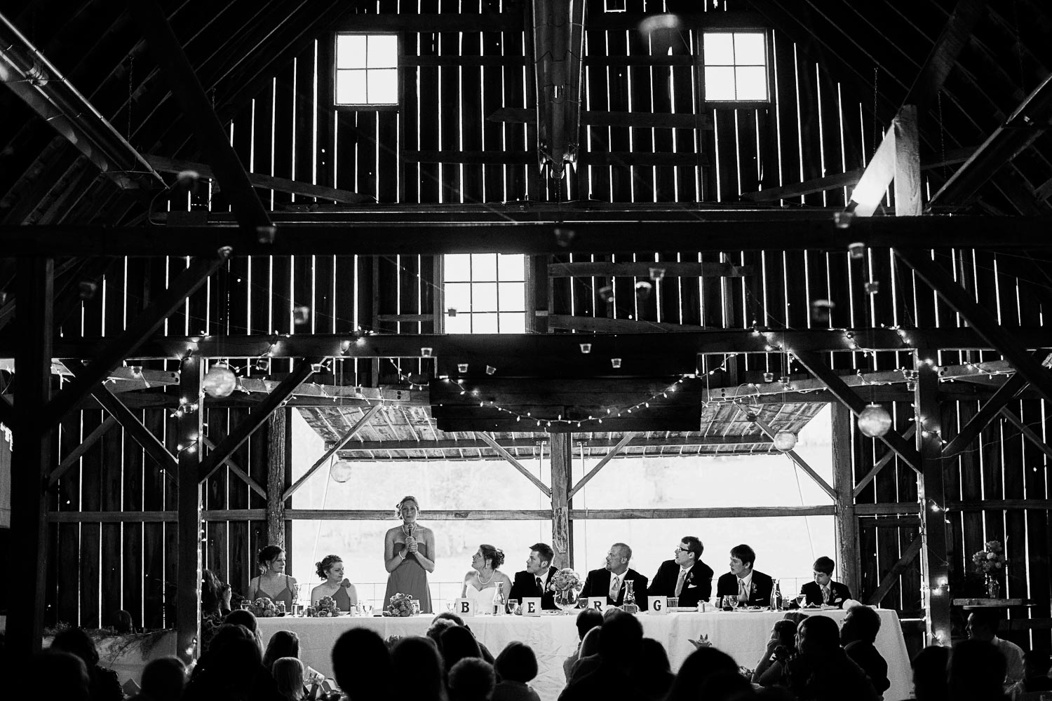 matron of honor giving a toast during the reception at the Enchanted Barn in Hillsdale Wisconsin