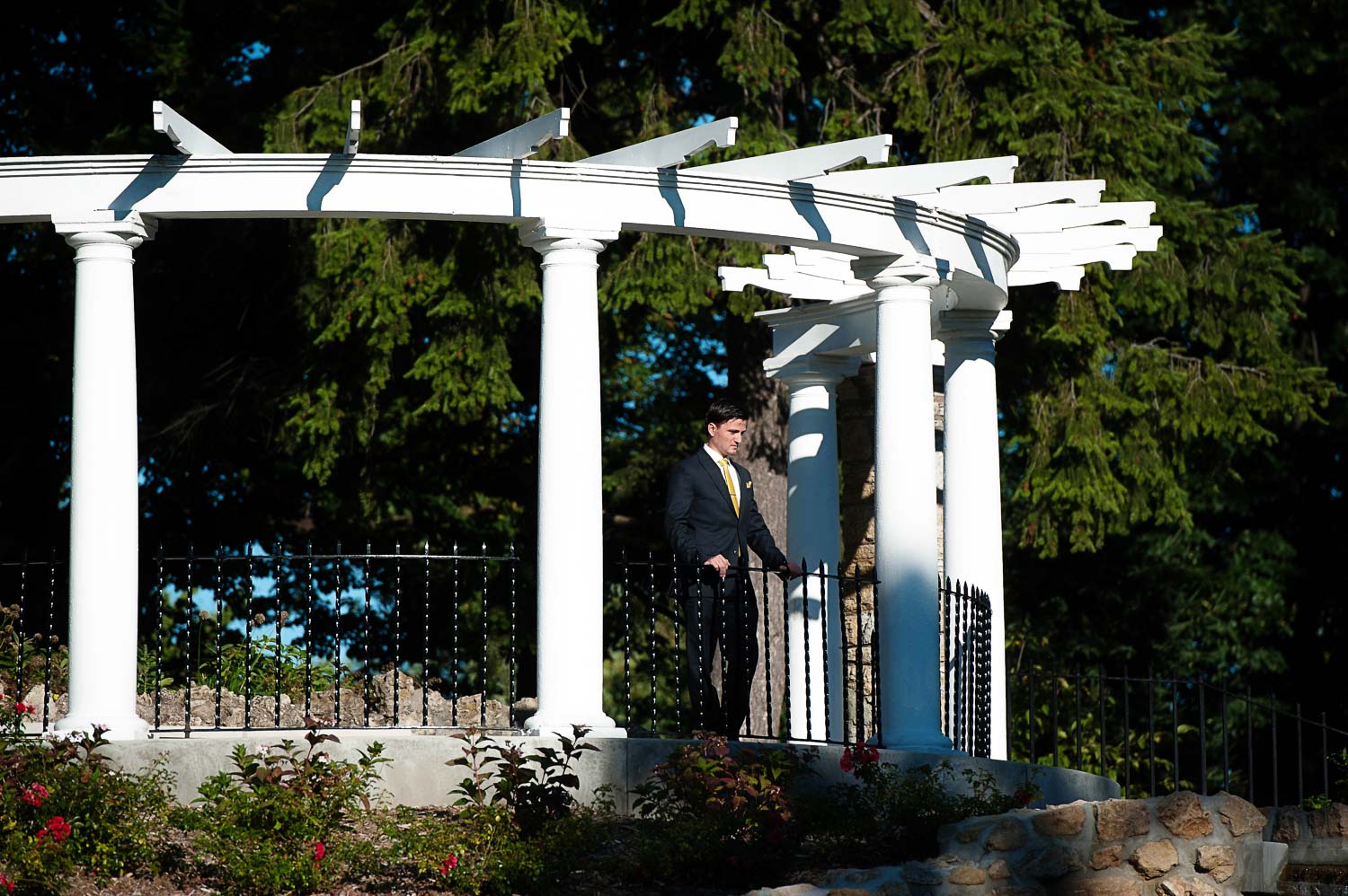 groom waiting for his bride for the first look before their Como Zoo wedding in St Paul