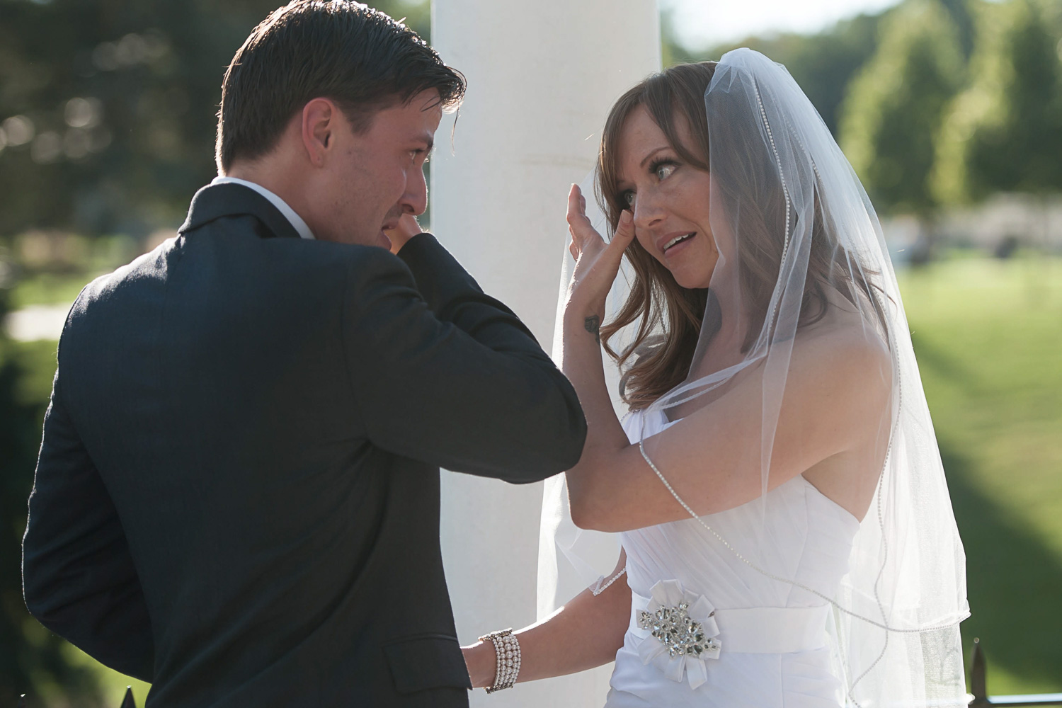 bride and groom during their first look during their Como Zoo wedding
