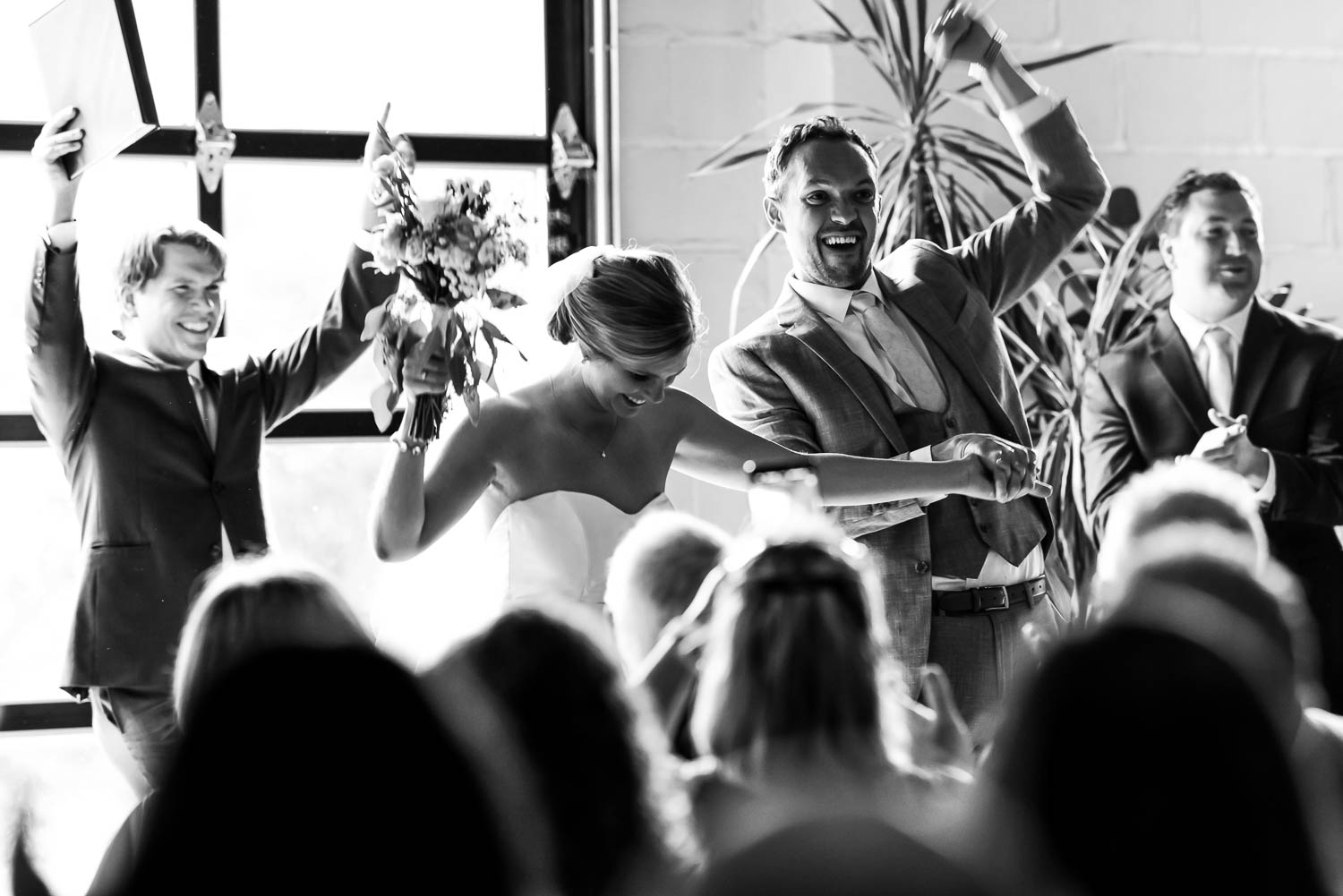 bride and groom excited during recessional at Paikka in St. Paul Minnesota