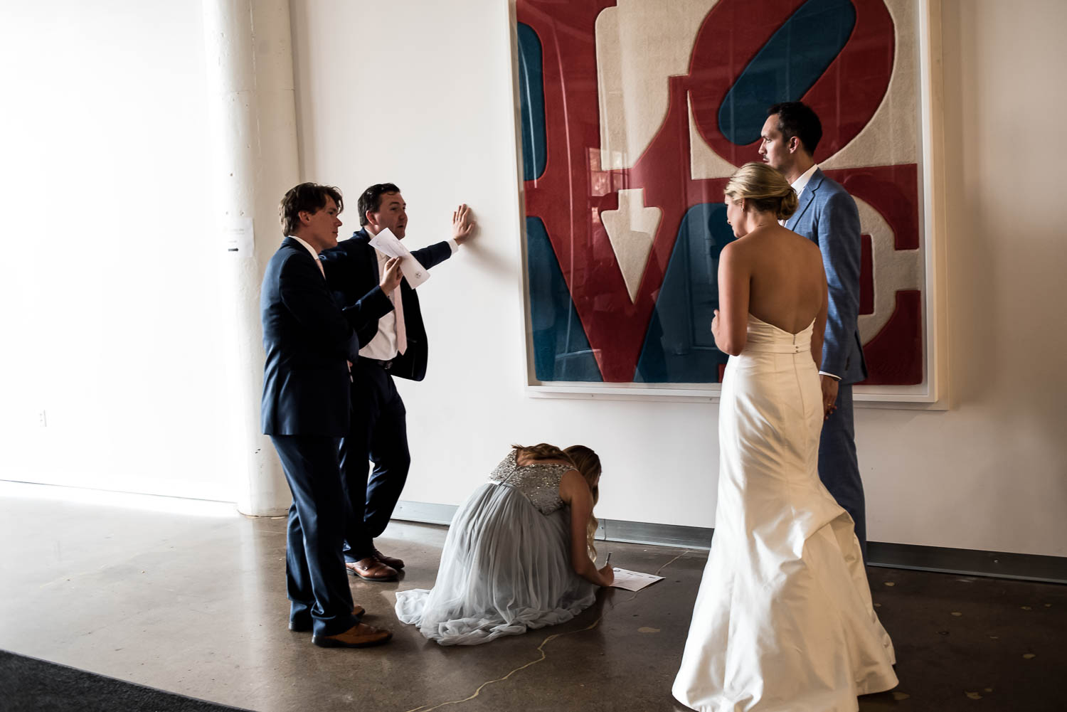 signing the marriage license with the bride and groom at Paikka