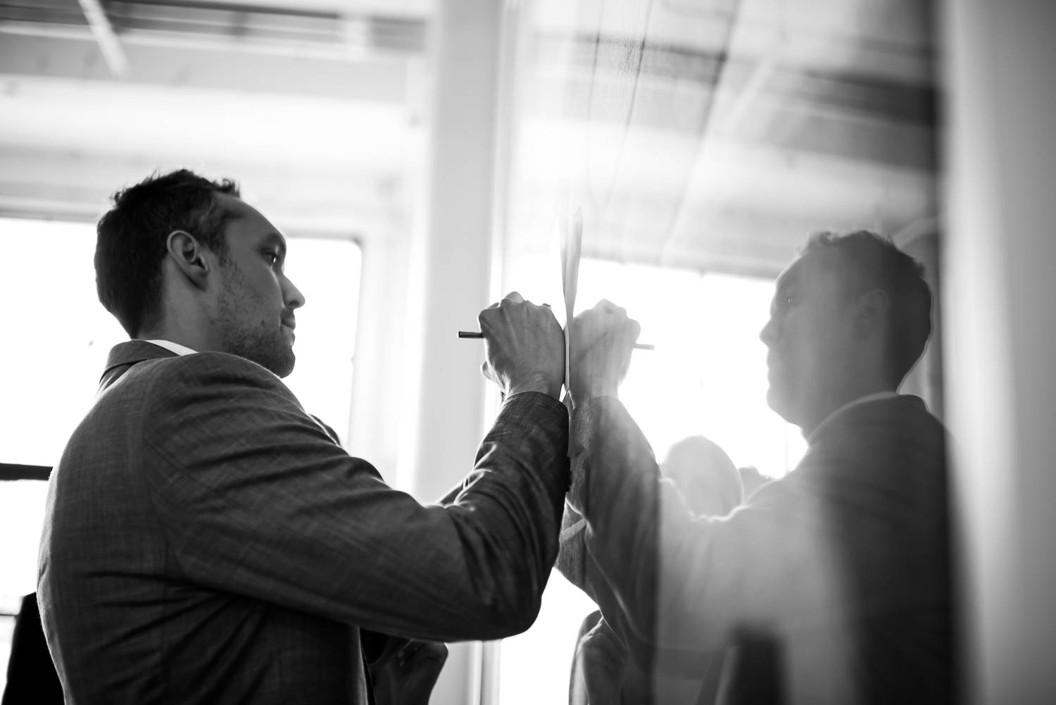 groom signing the marriage licence against refection at Paikka 