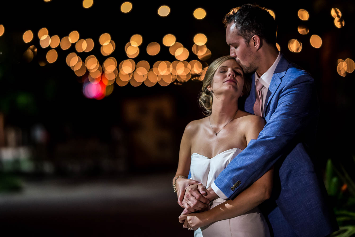 bride and groom kissing outside of Paikka in St.Paul