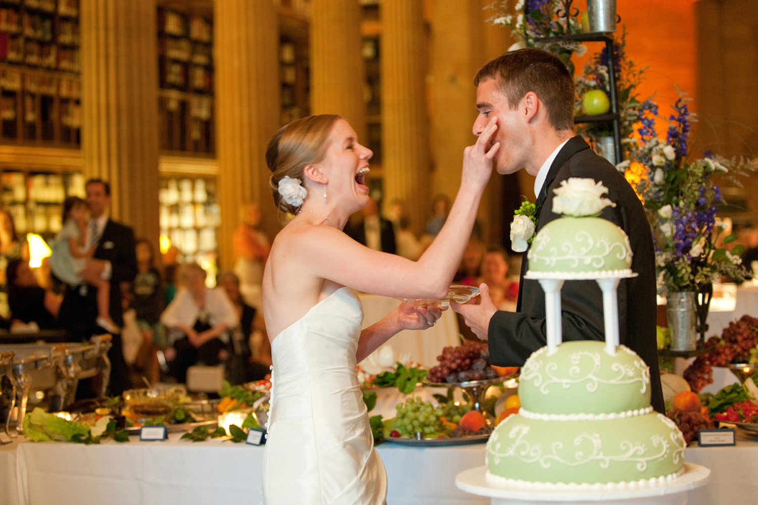 bride and groom cake cutting at James J Hill Library one of my 30 favorite venues in st paul