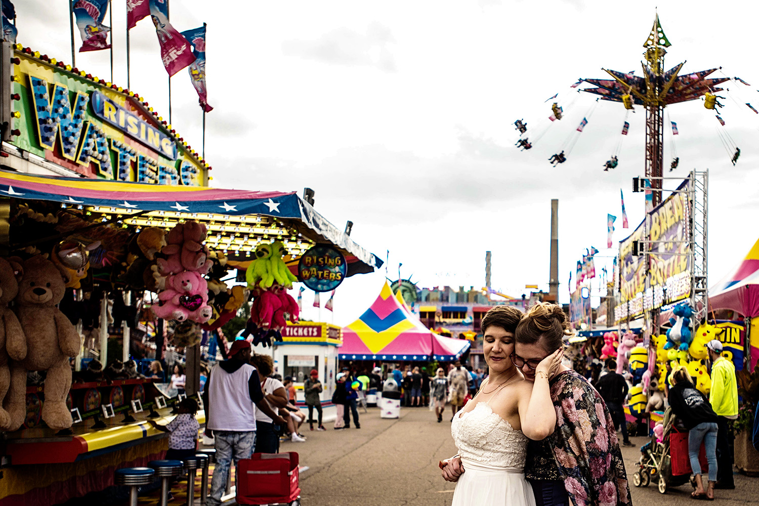sames sex wedding bride and bride on the midway at the minnesota state fair 