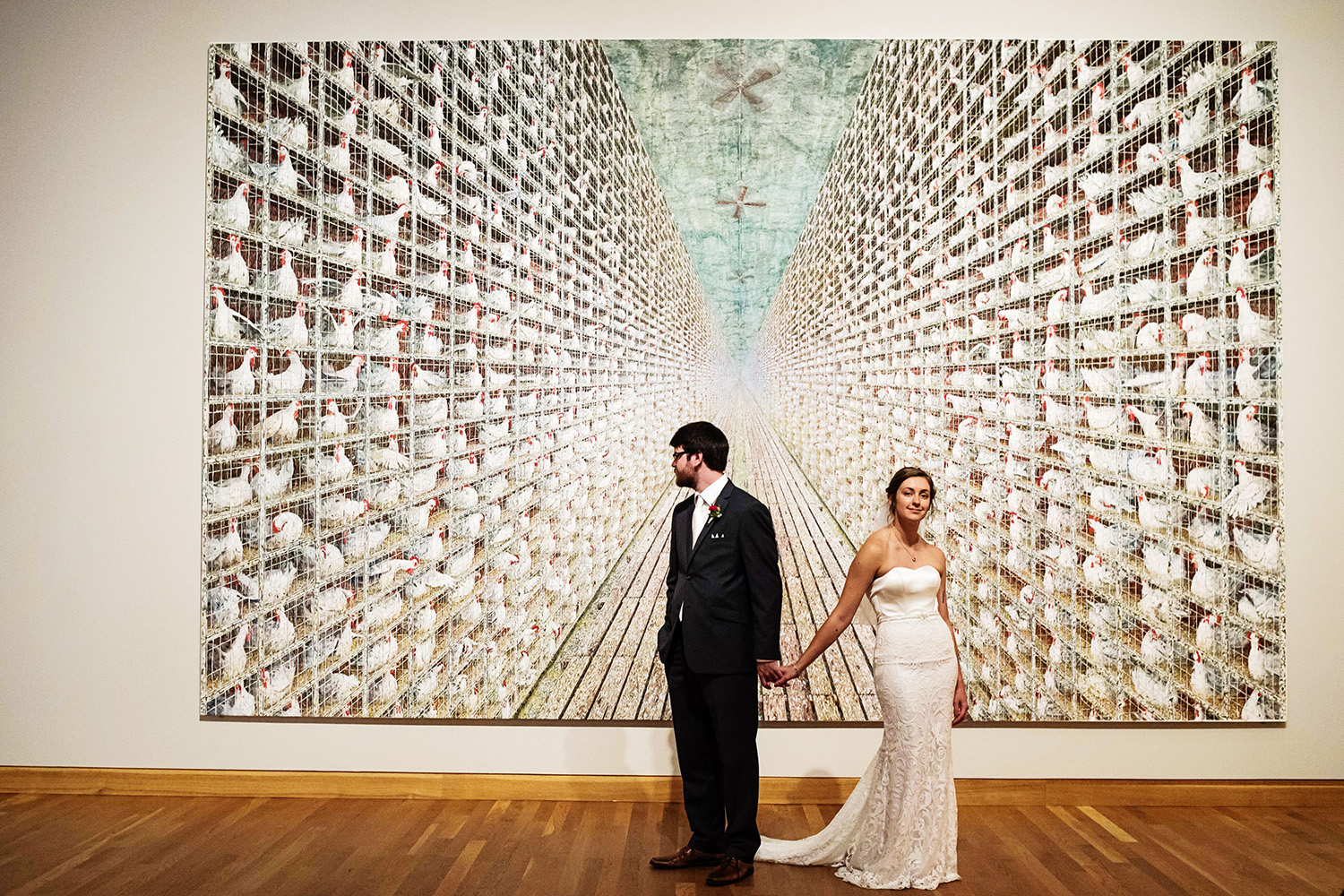 bride and groom in a museum at theWeisman