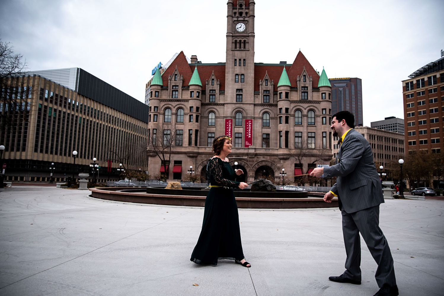 Harry Potter wedding bride and groom with magic wands in Rice Park