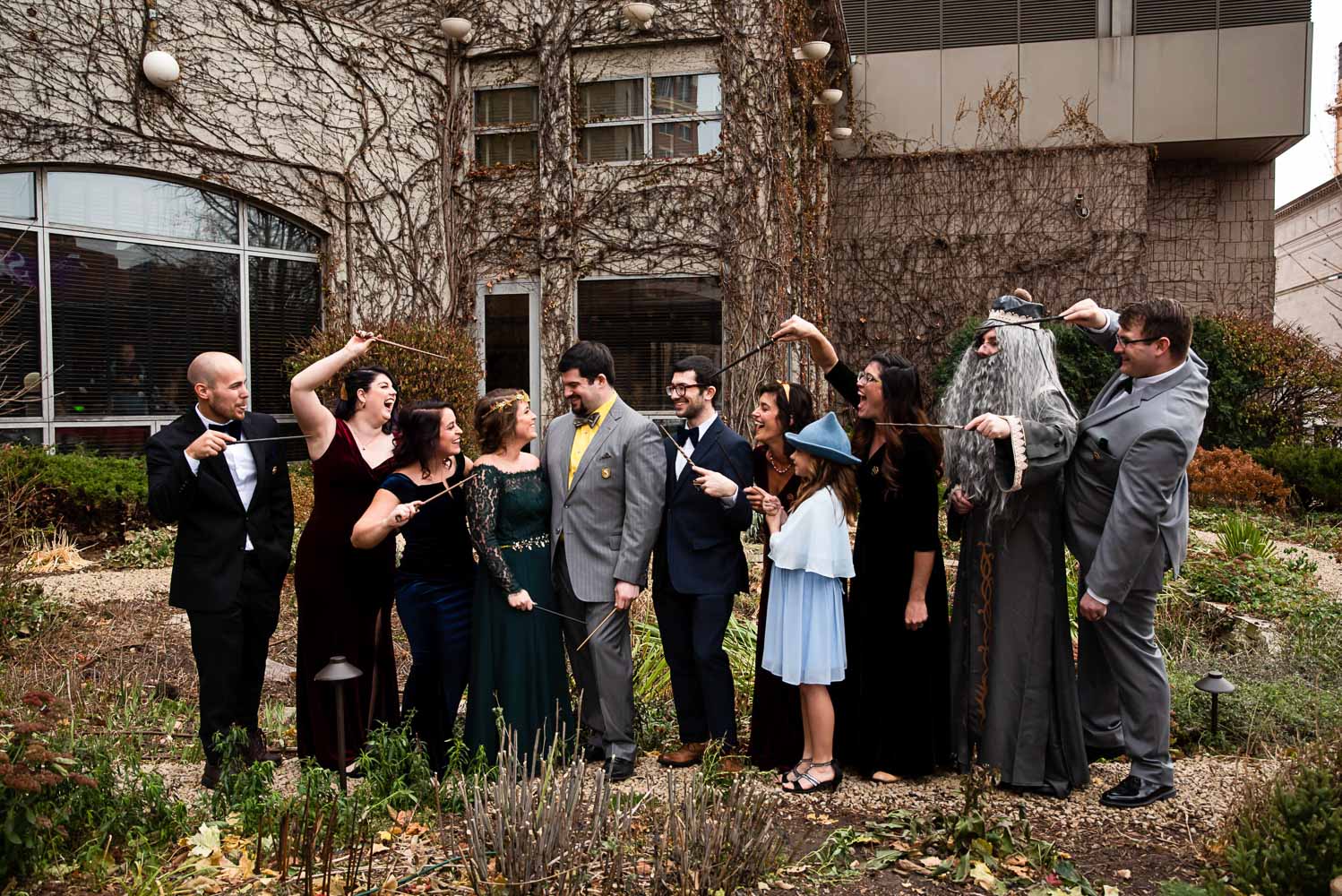 wedding party for the Harry Potter wedding with everyone dressed in house colors