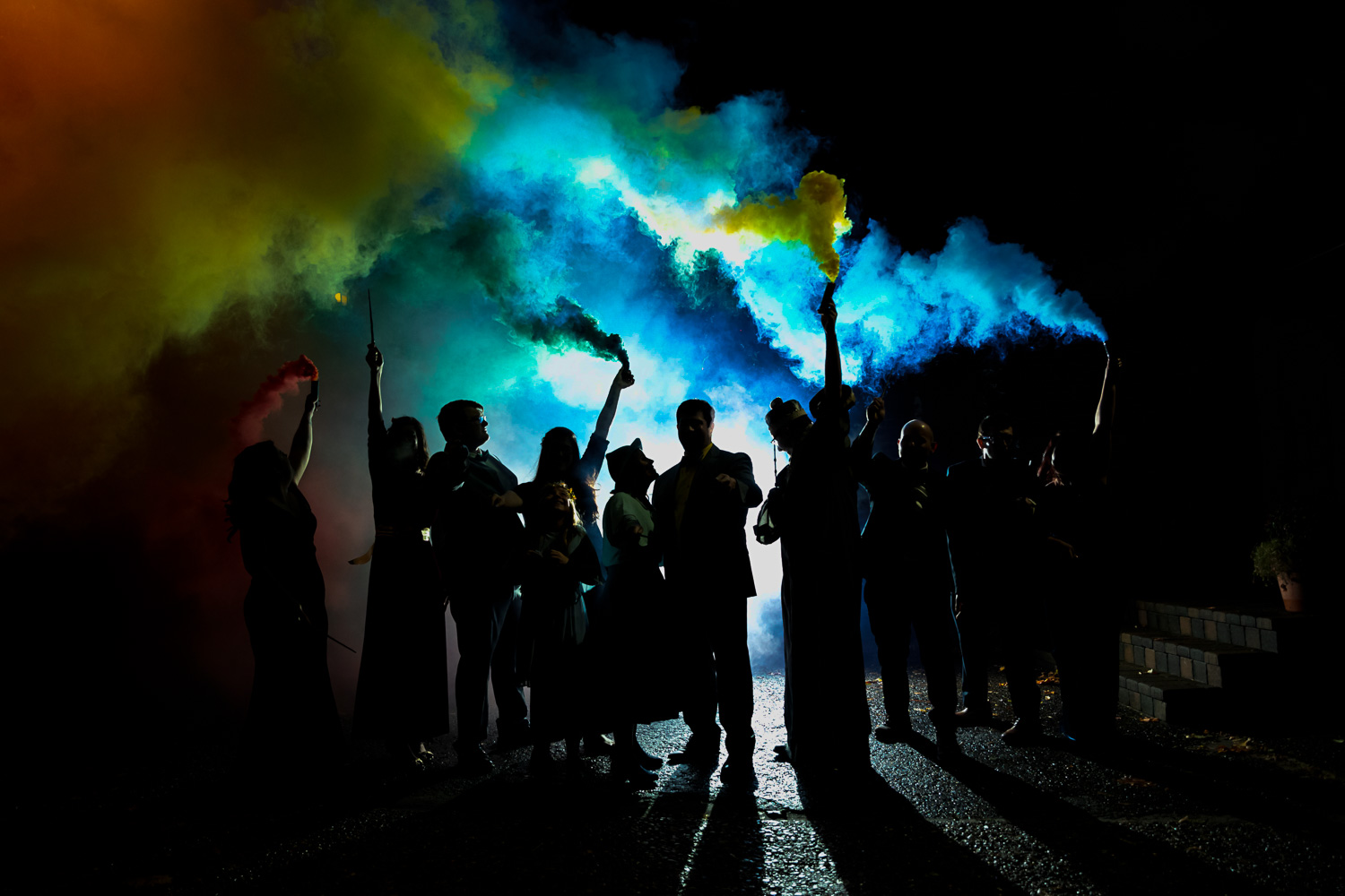 Back lit smoke bombs at a Harry Potter wedding