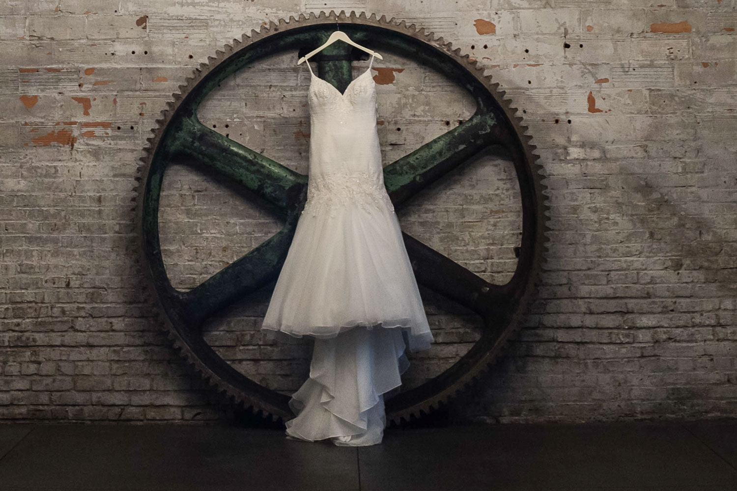 wedding dress hanging up at Aria in Minneapolis