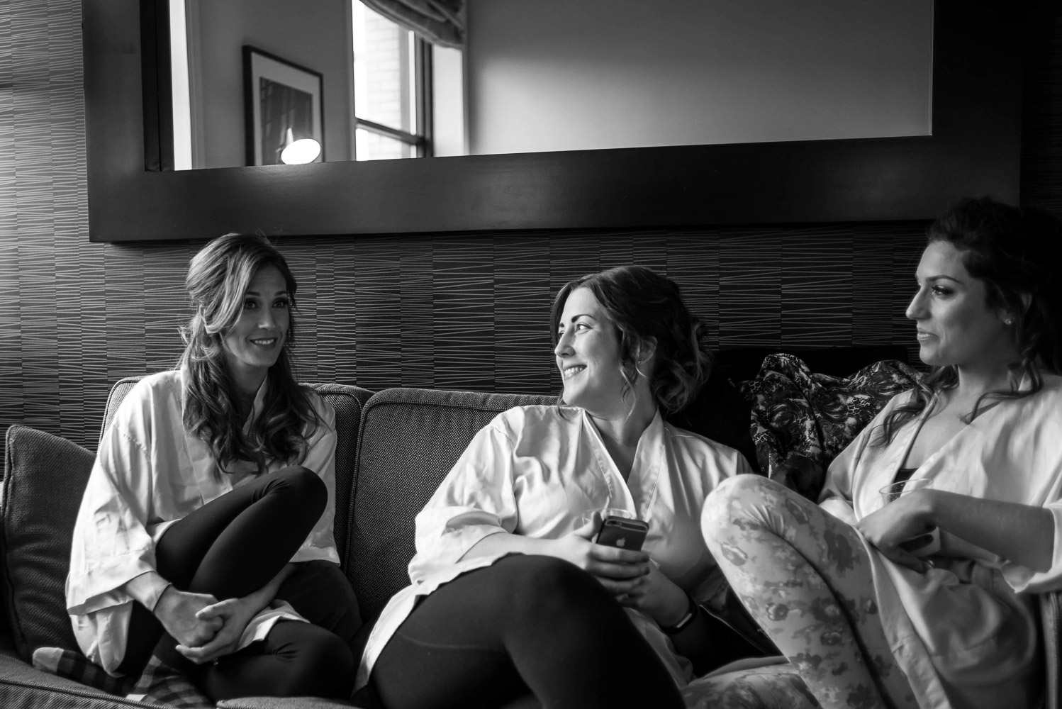 bridesmaids hanging out in the getting ready room