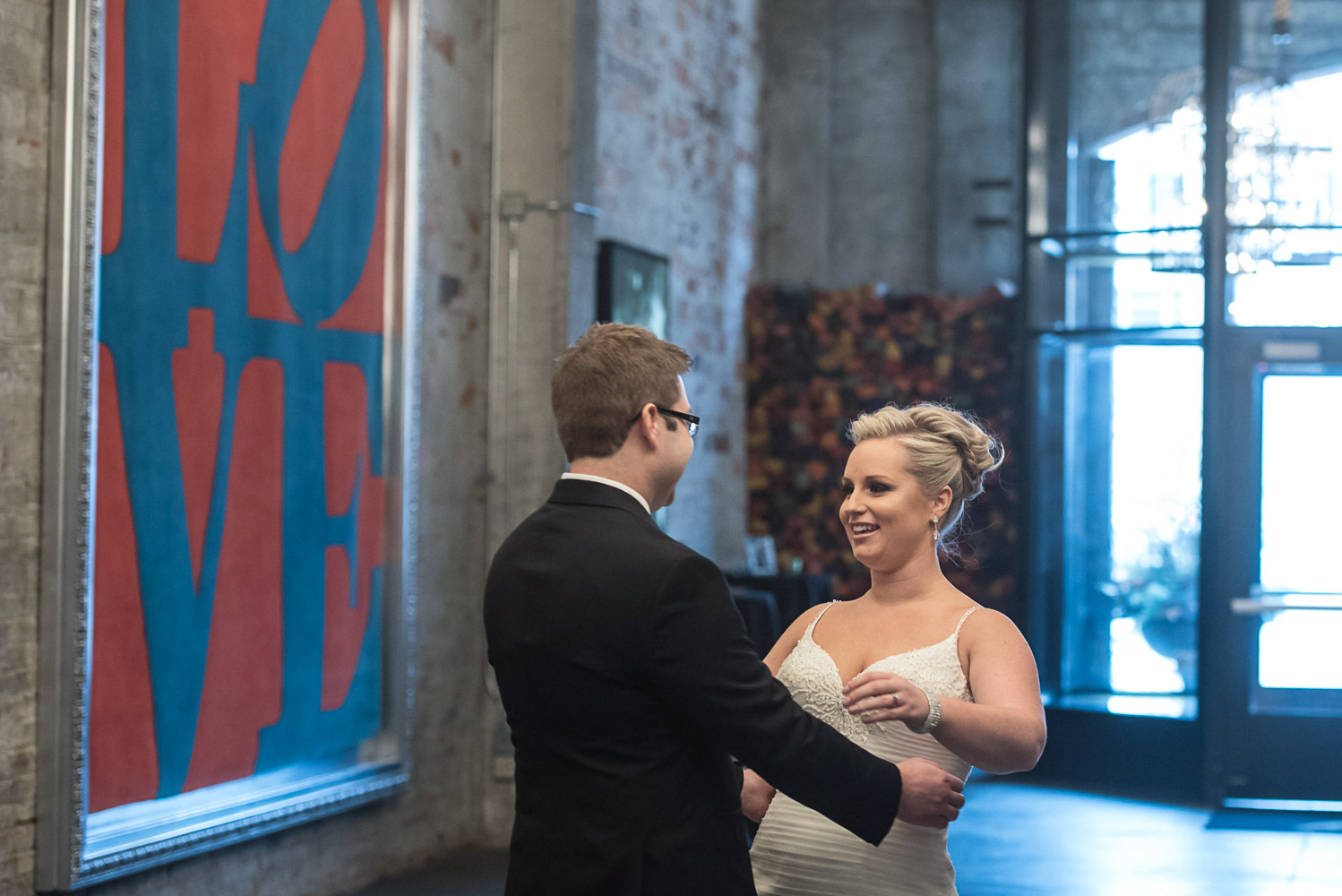 bride and groom first look at Aria in Minneapolis