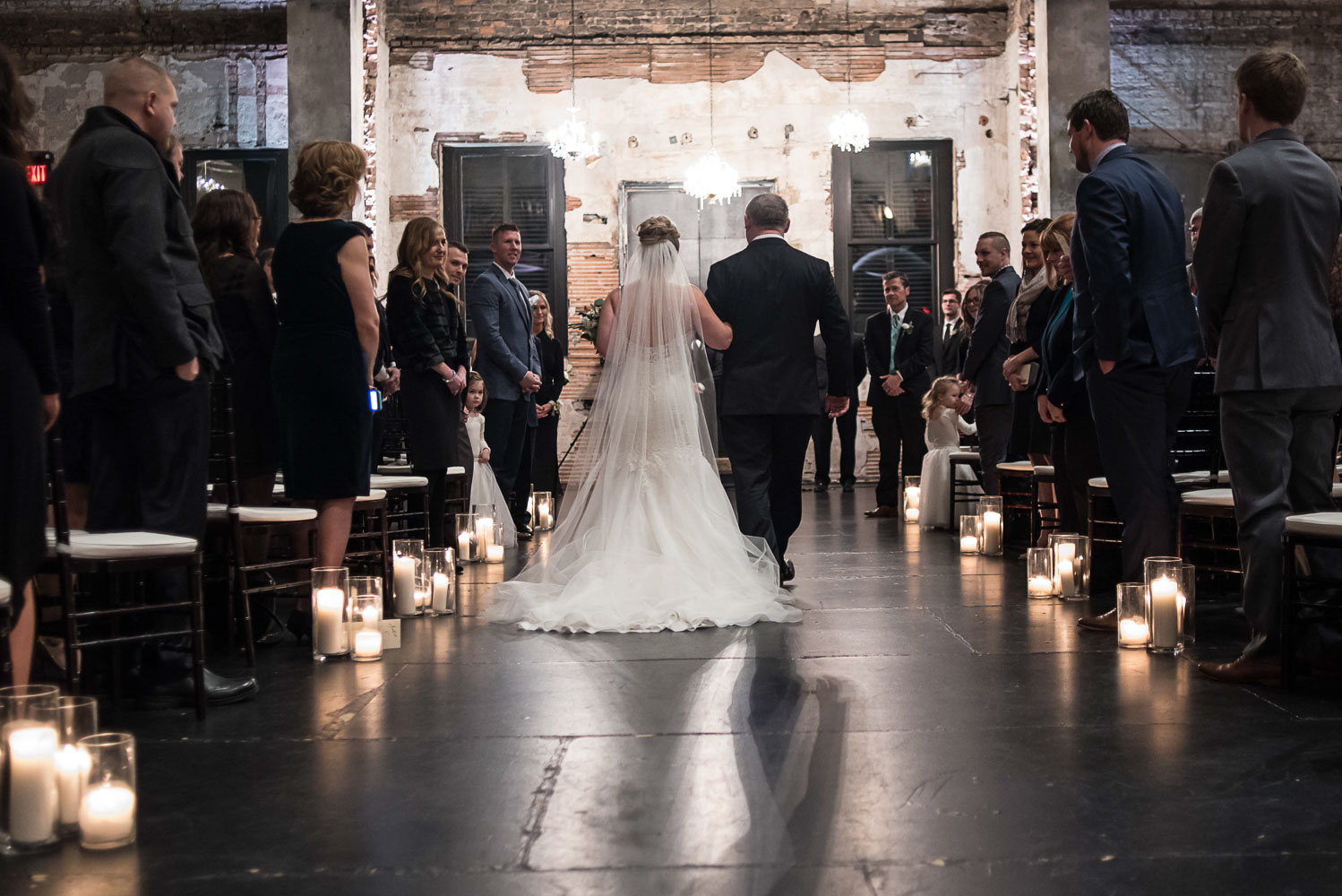 bride and her dad walking to the groom at Aria in Minneapolis