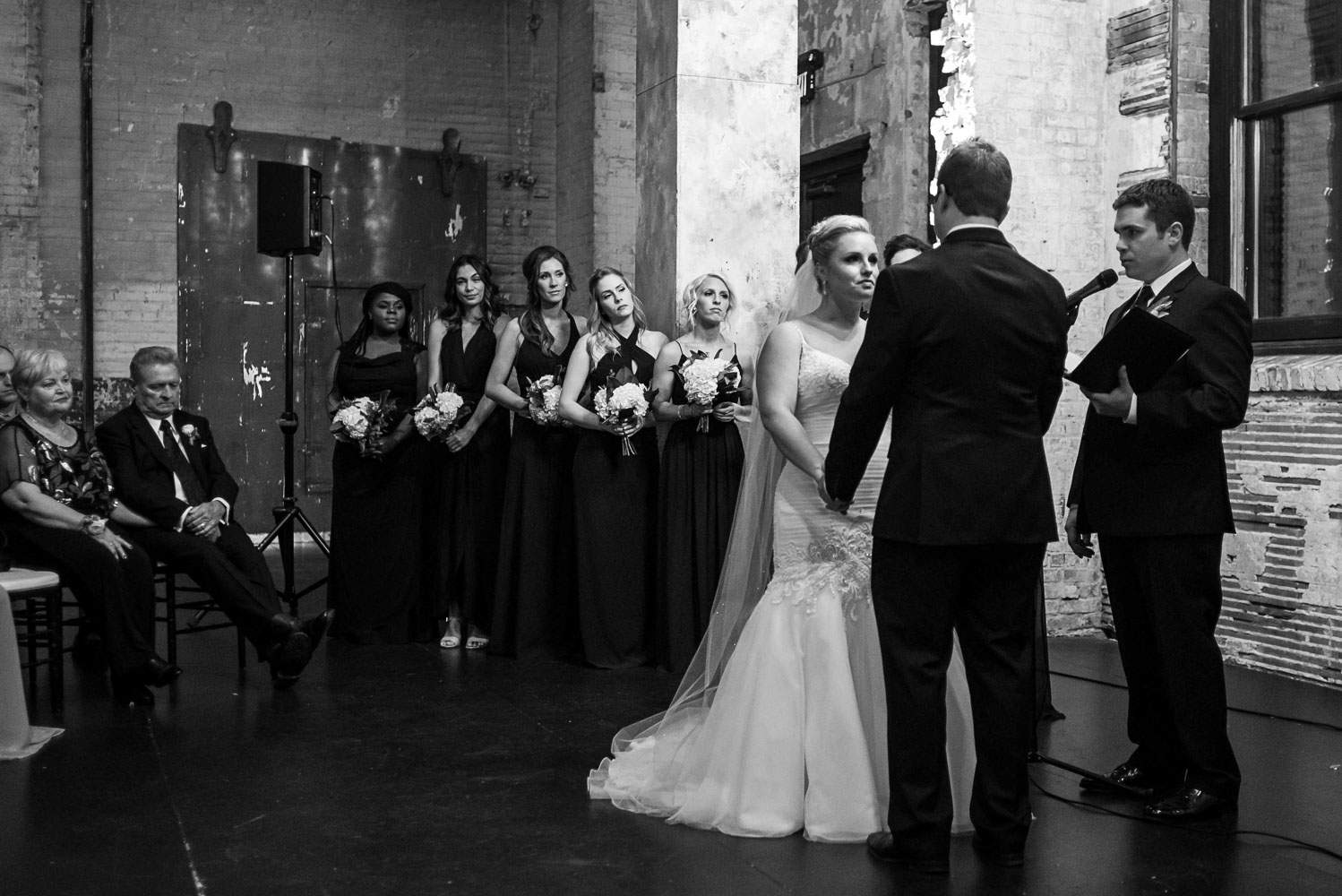 bride and groom exchanging vows at their Aria wedding in Minneapolis Minnesota
