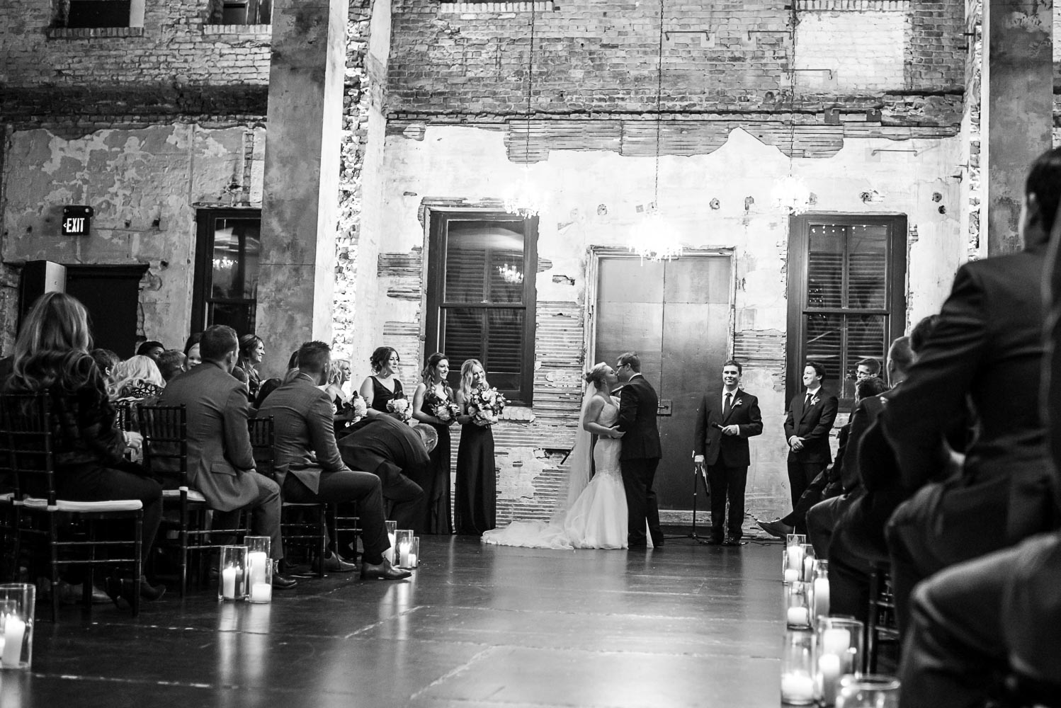 bride and groom's first kiss after the were married at Aria in Minneapolis