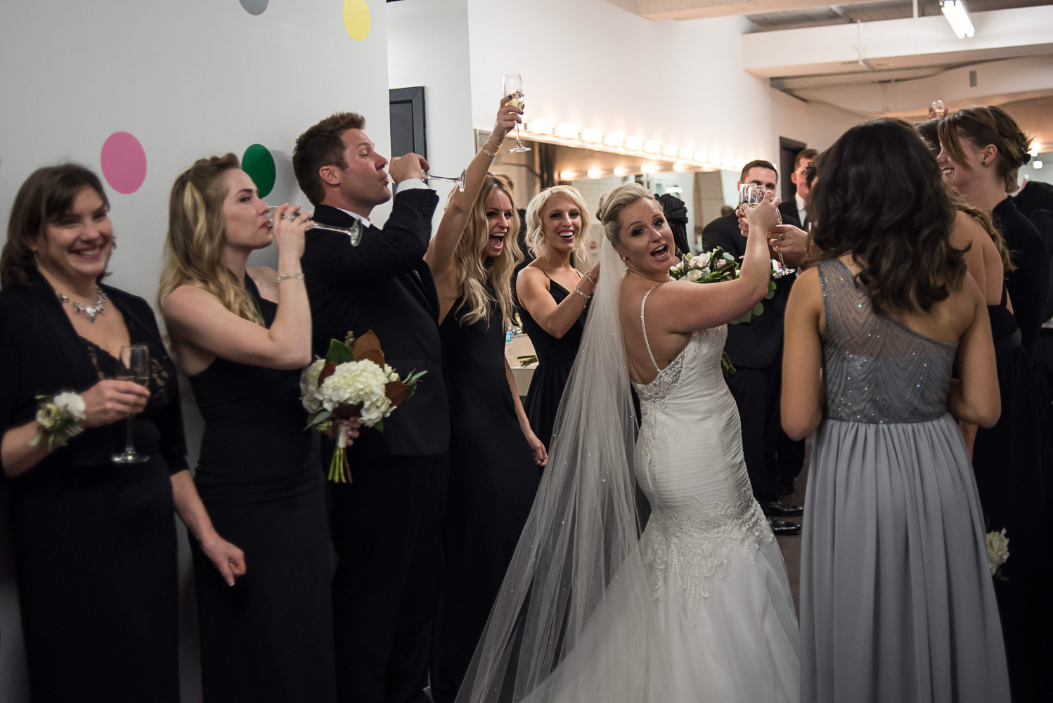 toasting after the ceremony in the dressing room at Aria