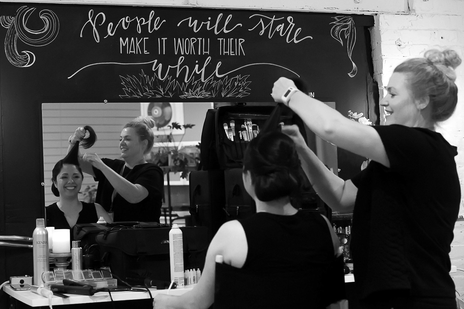 bride getting her hair done in the dressing room at Neu Neu