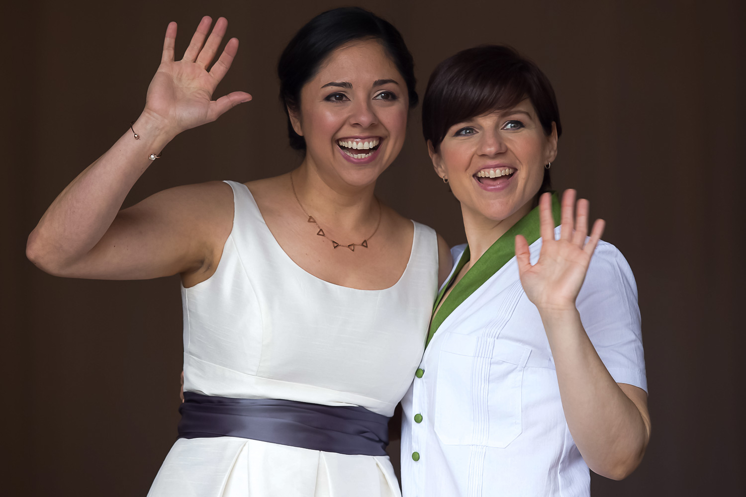 brides waving to their guests at Neu Neu in Minneapolis