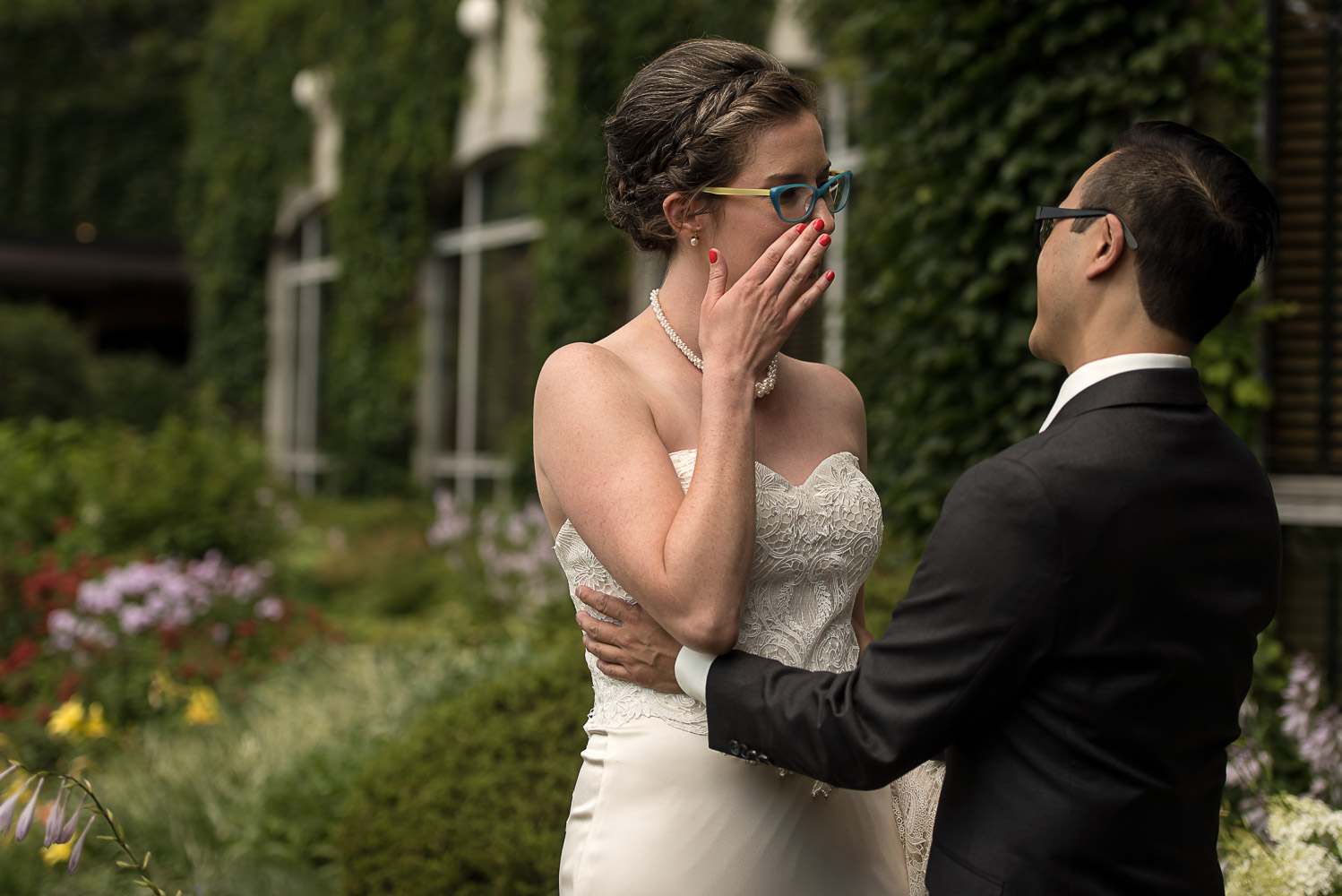 bride crying while seeing her groom during their first look