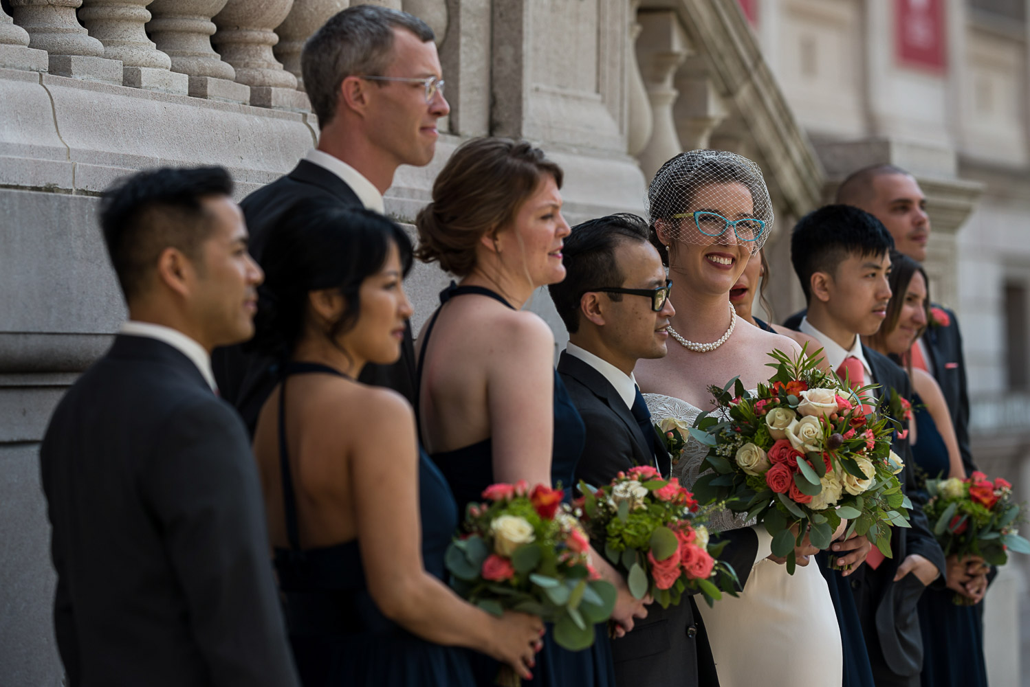 wedding party portrait in front of the James J Hill Library
