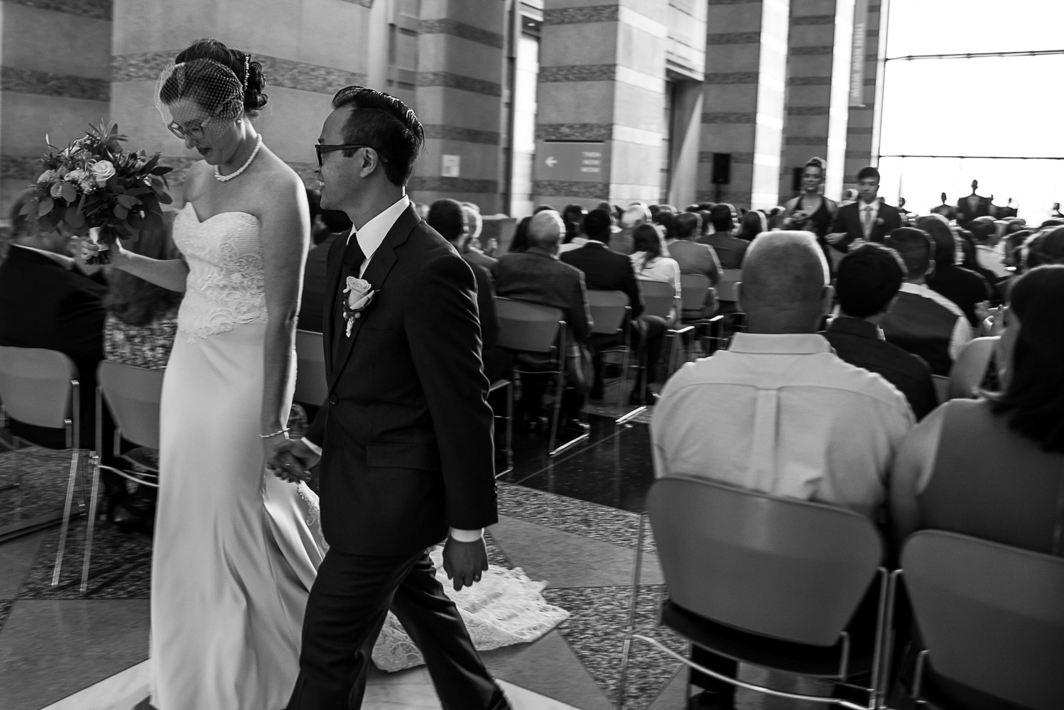 bride and groom during the recessional at the Minnesota History Center in St Paul