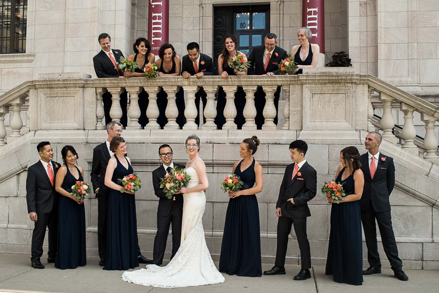 wedding party portrait in front of the James j Hill library in St Paul