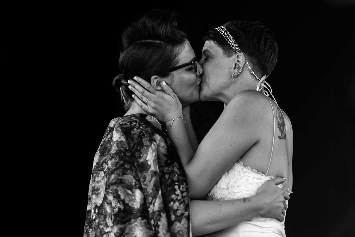 first kiss at a queer wedding