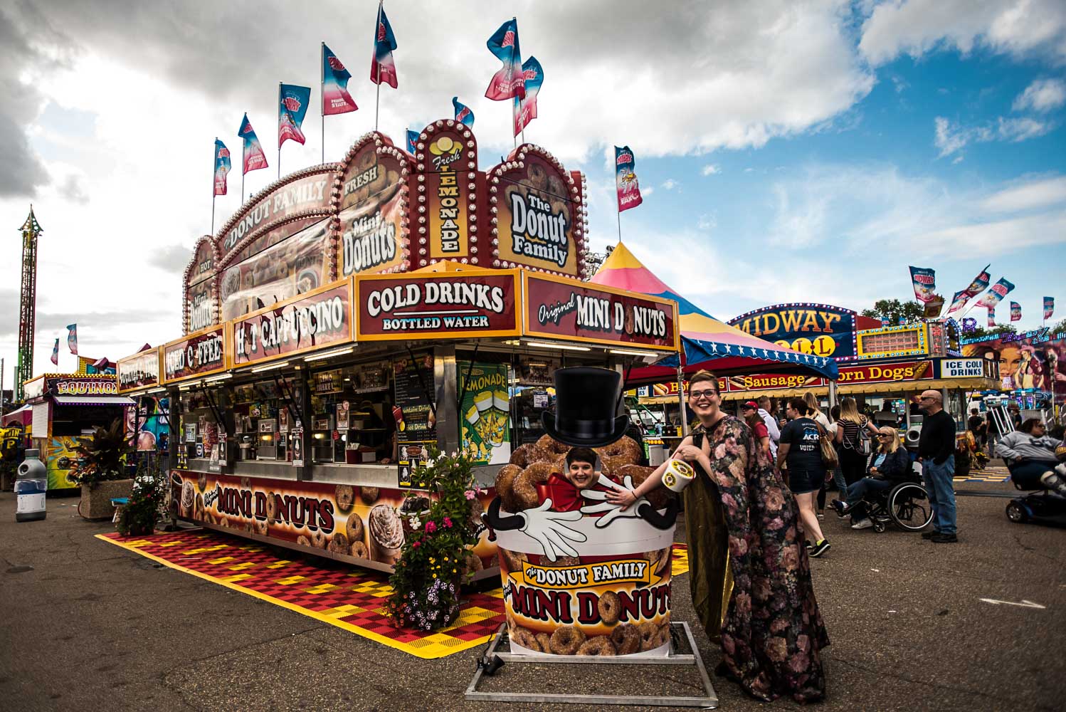 same sex couple on the midway at the Minnesota State Fair