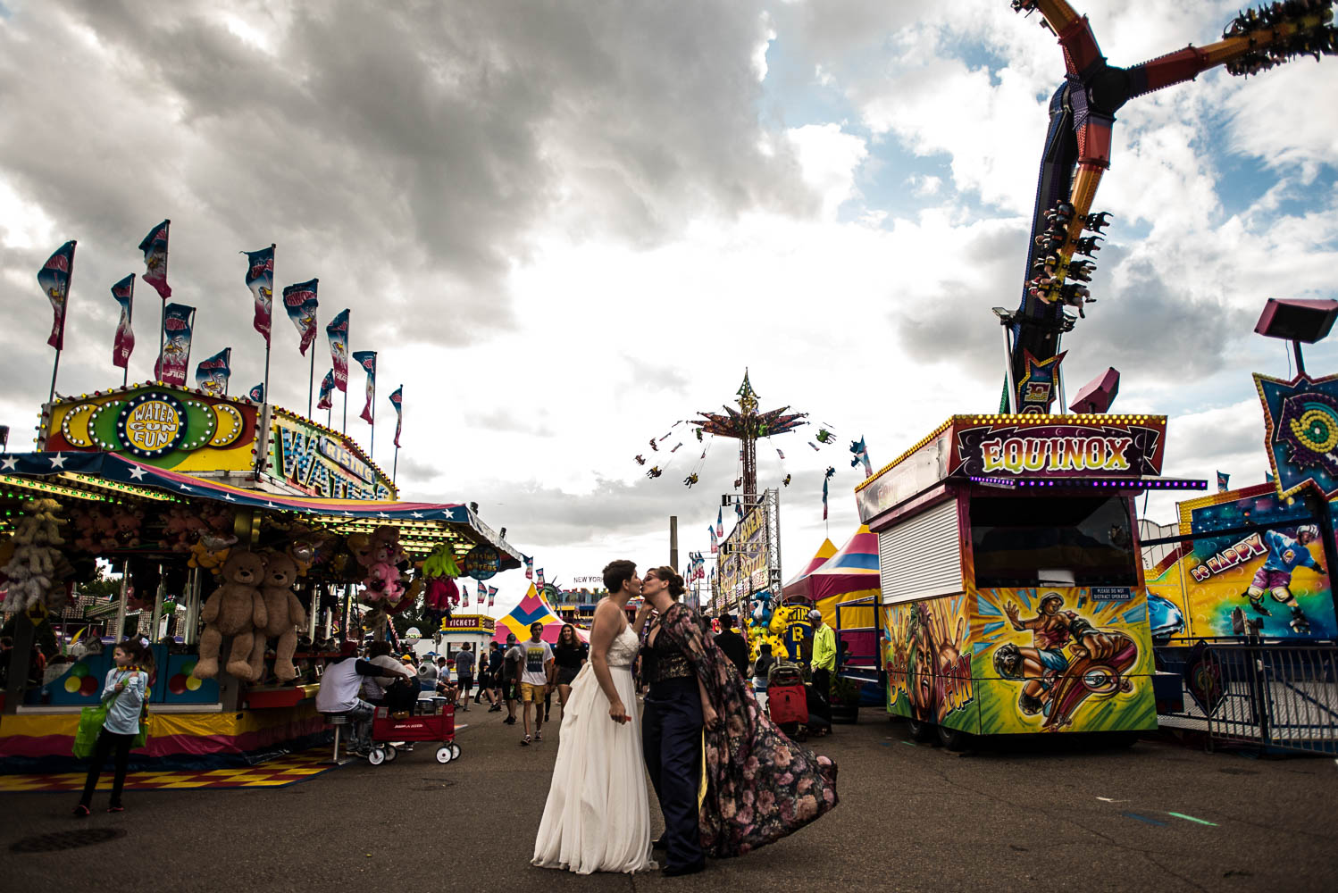 queer couple kissing at the State Fair in Minnesota