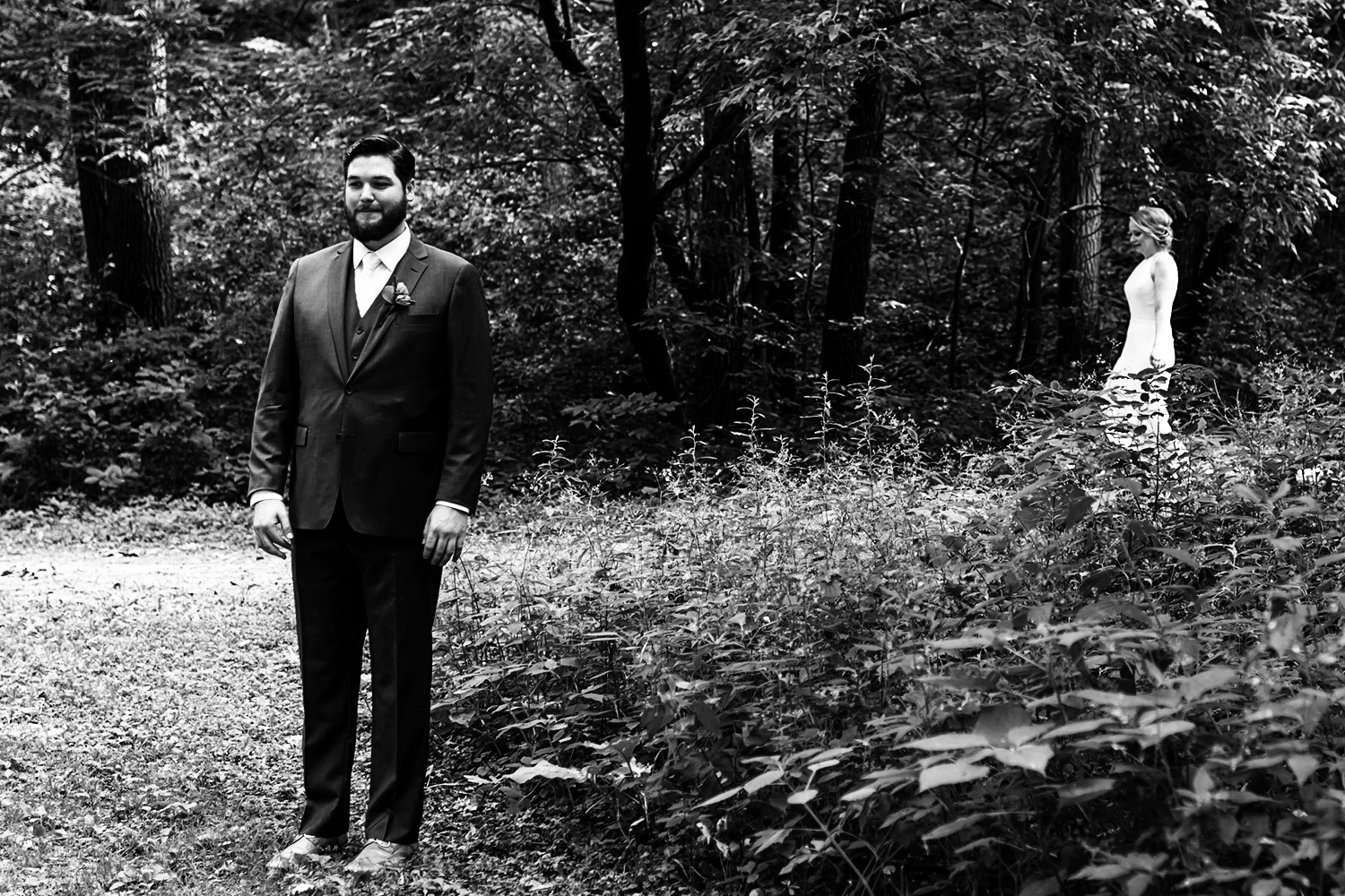 first look with bride and groom at Hidden Falls in St. Paul