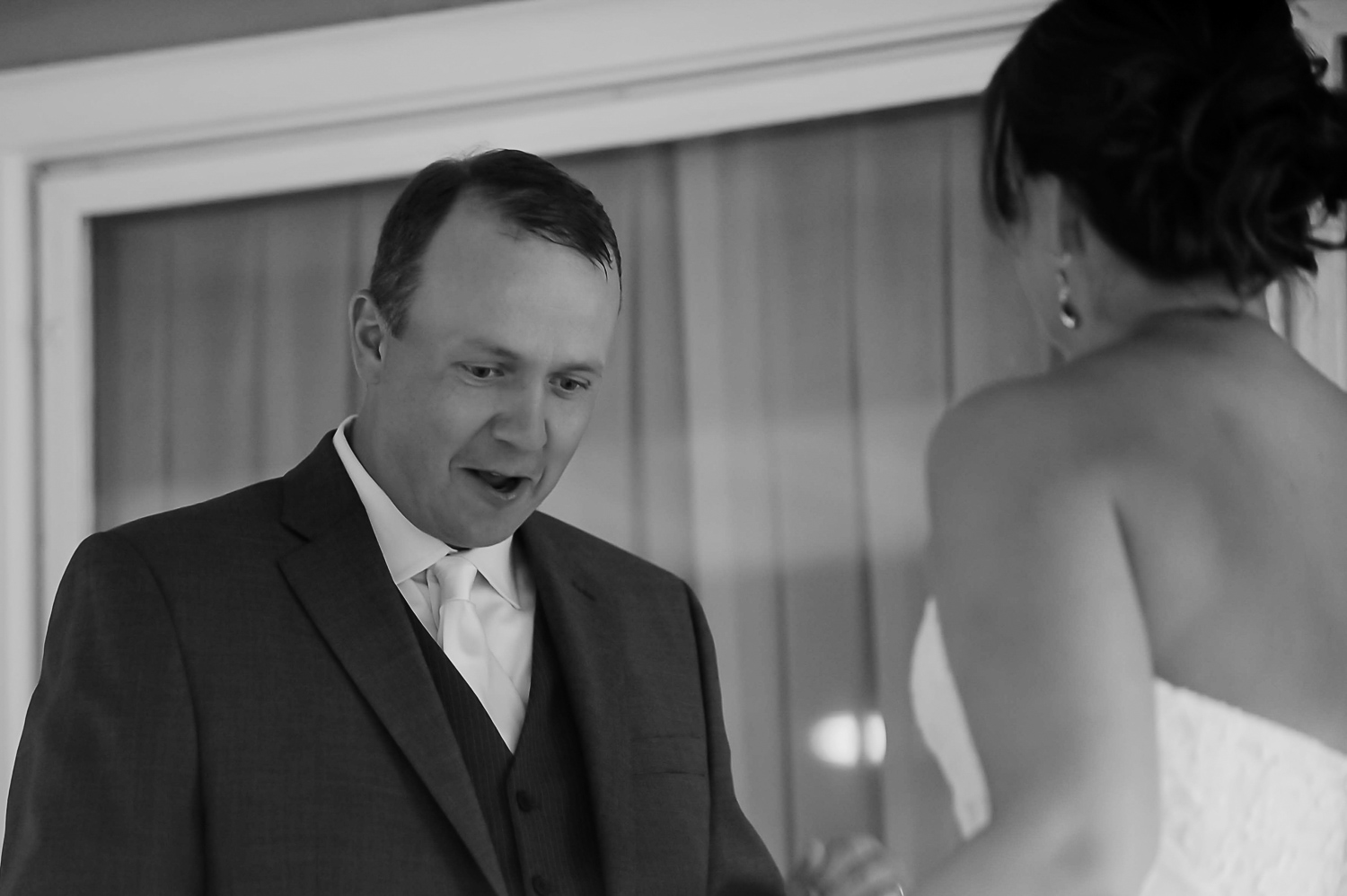 groom seeing his bride for the first time on their wedding day 