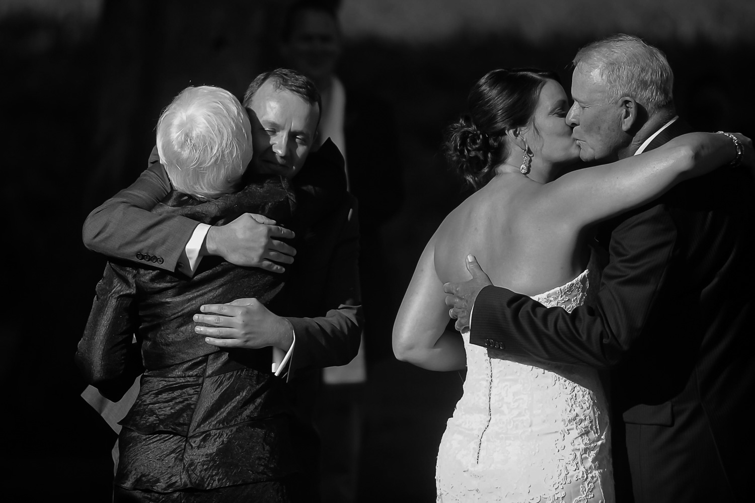 bride hugging her father before the wedding ceremony on their Iowa Farm
