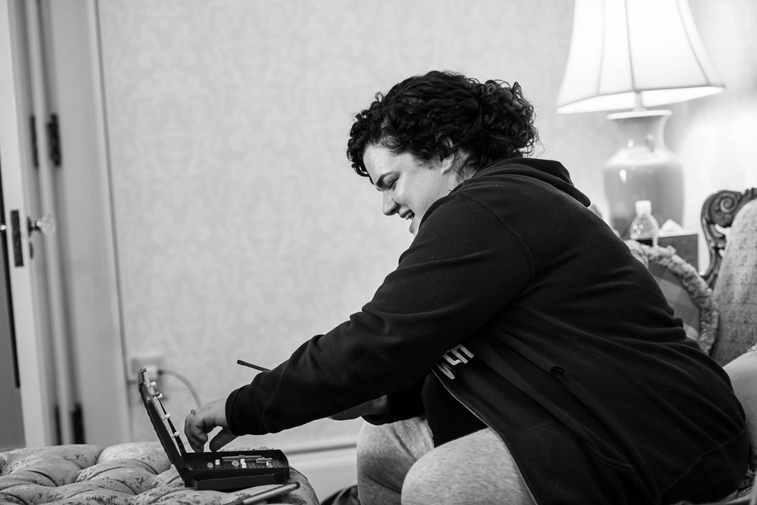 bride playing Battleship with the groom on their wedding day