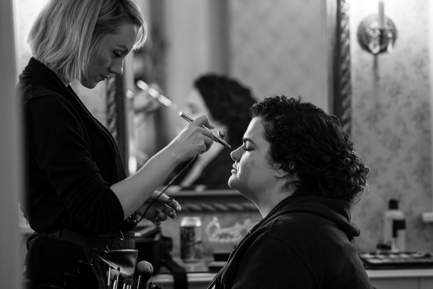 bride getting her makeup on at the St Paul College Club