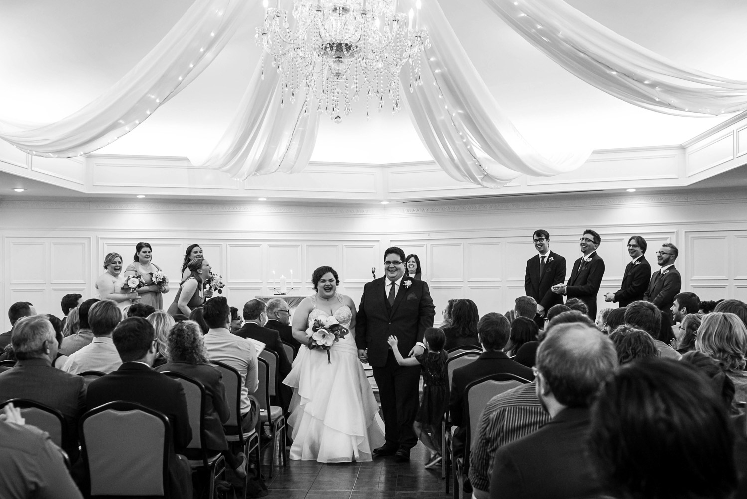 bride and groom during the recessional at the St Paul College Club in Minnesota