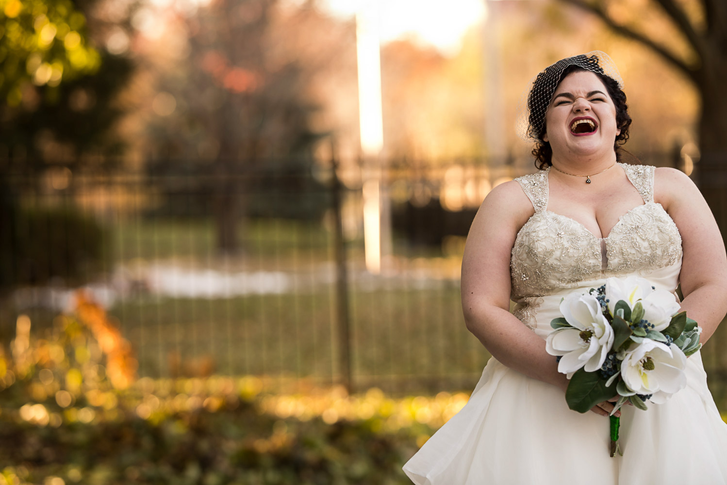 laughing bride on her wedding day at the St Paul College Club in Minnesota