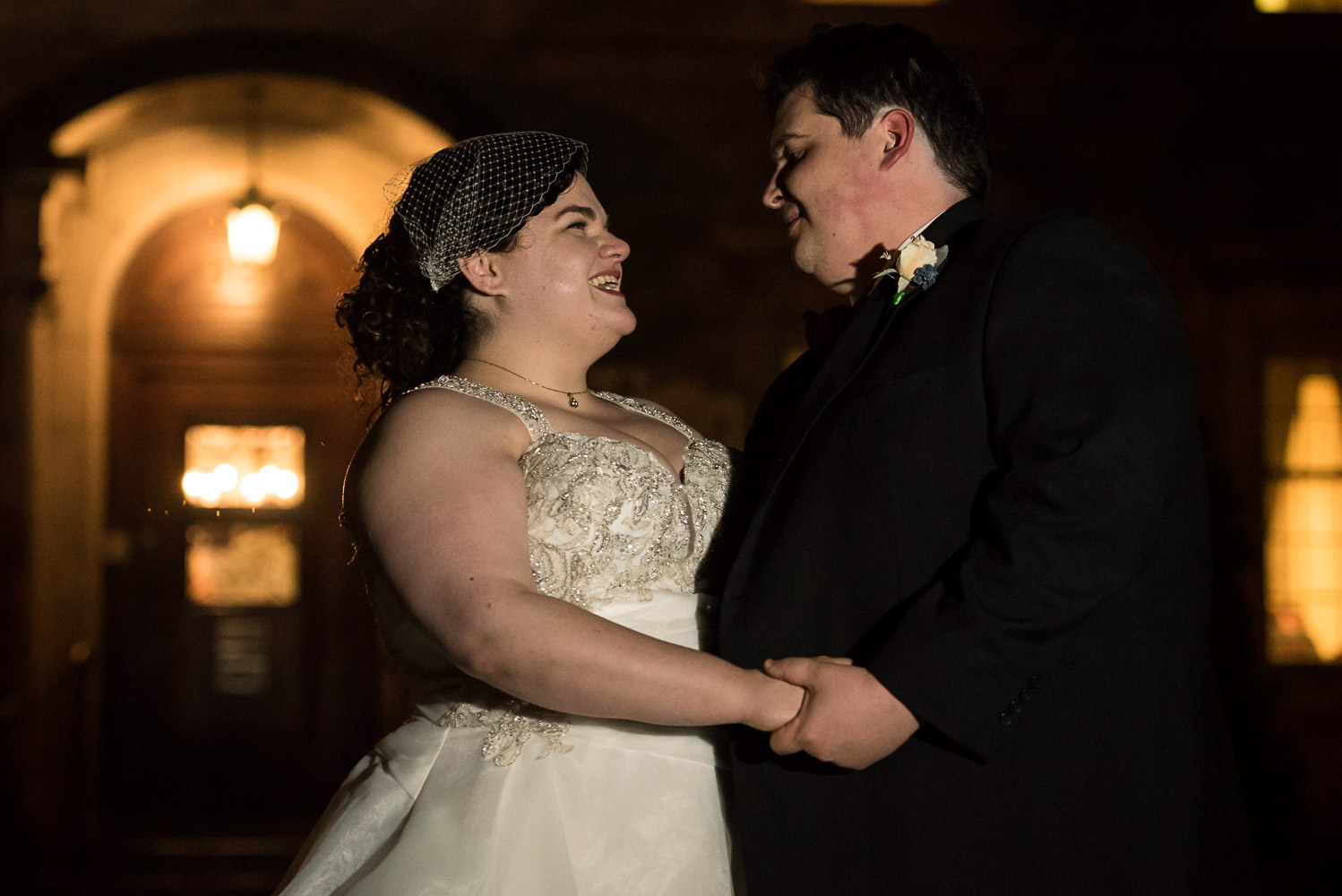 bride and groom in front of the St Paul College Club