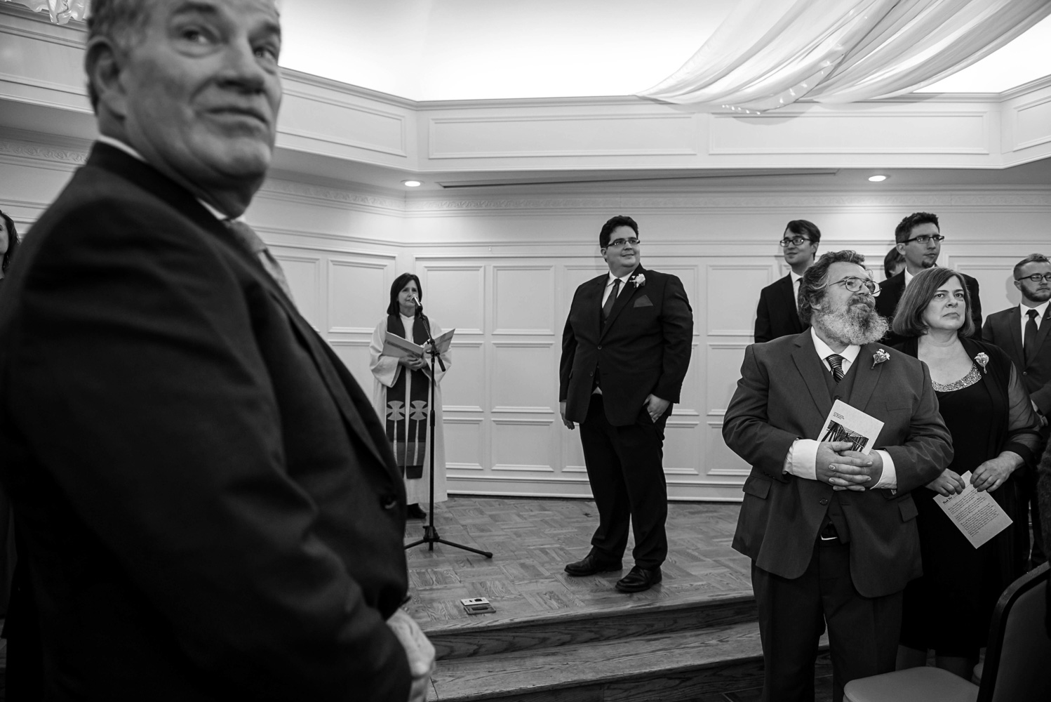 groom waiting for bride to come down the aisle at the St Paul College Club