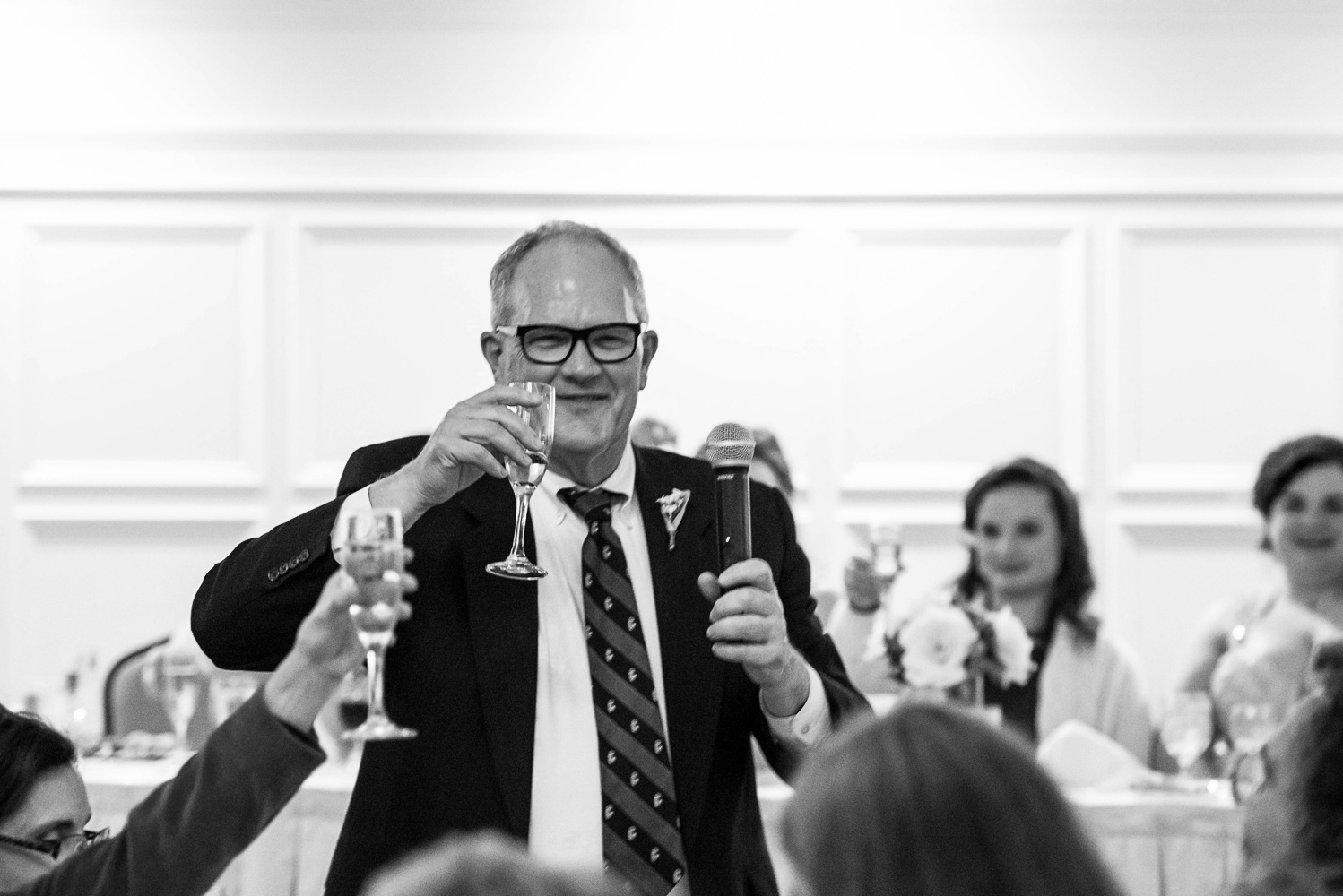 dad giving a toast at the St Paul College Club
