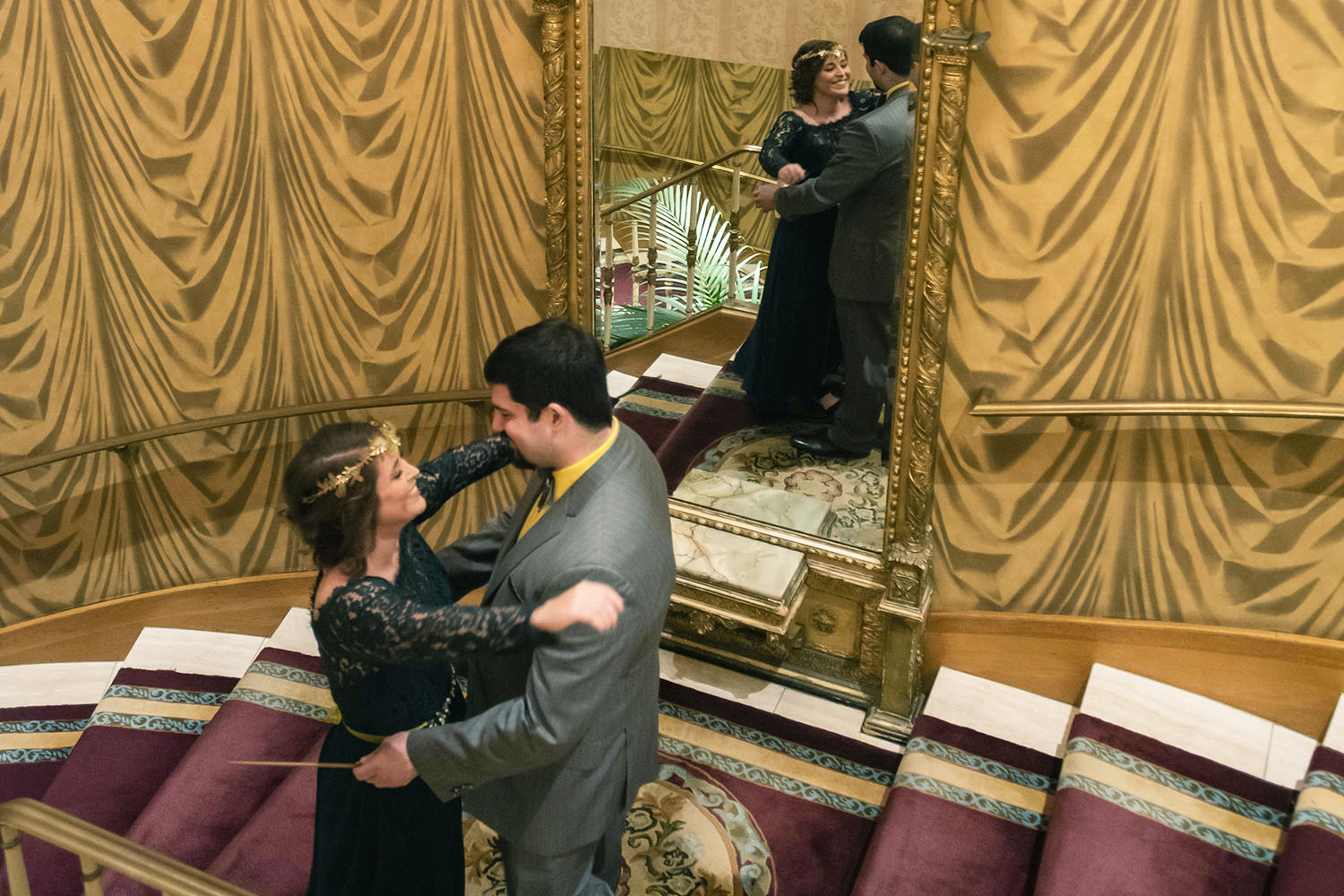 bride and groom doing their first look on the staircase at the St Paul Hotel in Minnesota