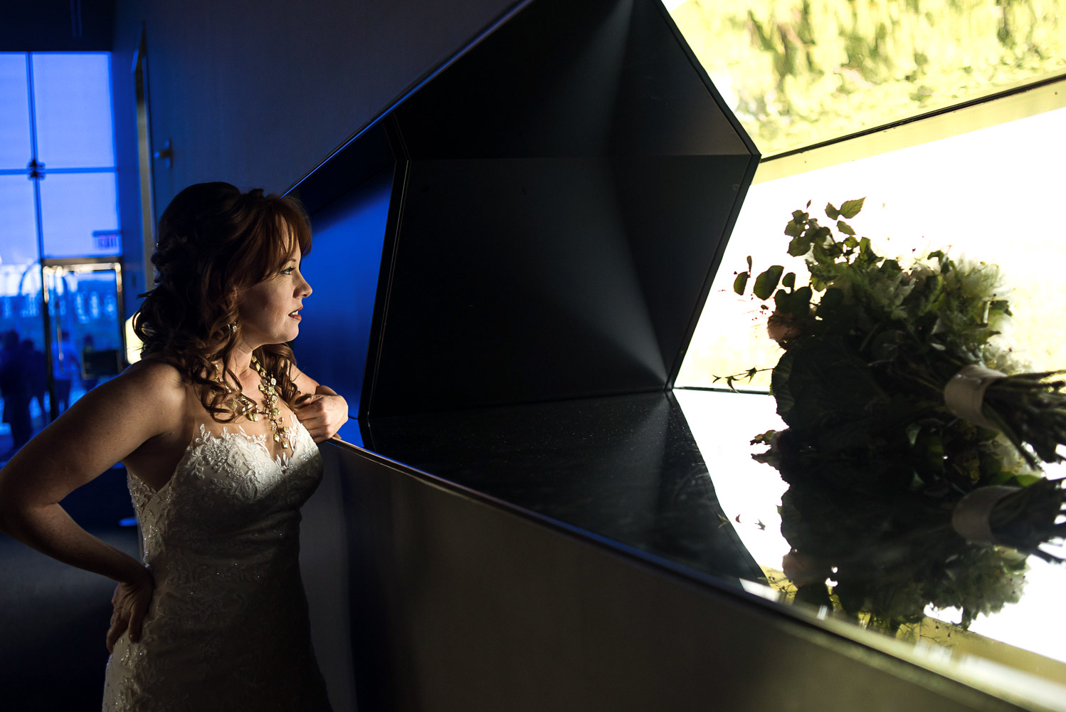 bride looking out the window at the Guthrie in Minneapolis