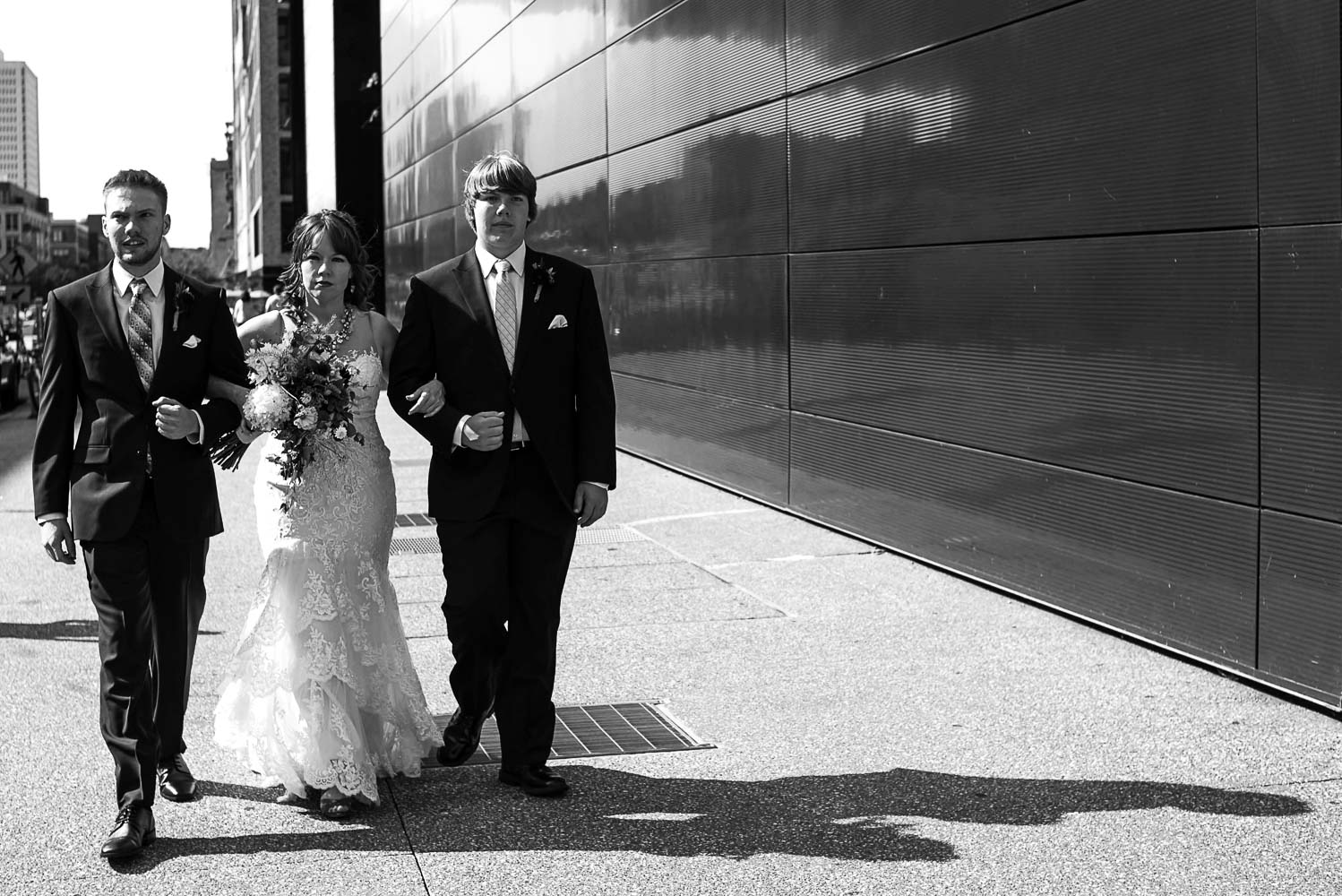bride walking with her kids next to the Guthrie to the ceremony