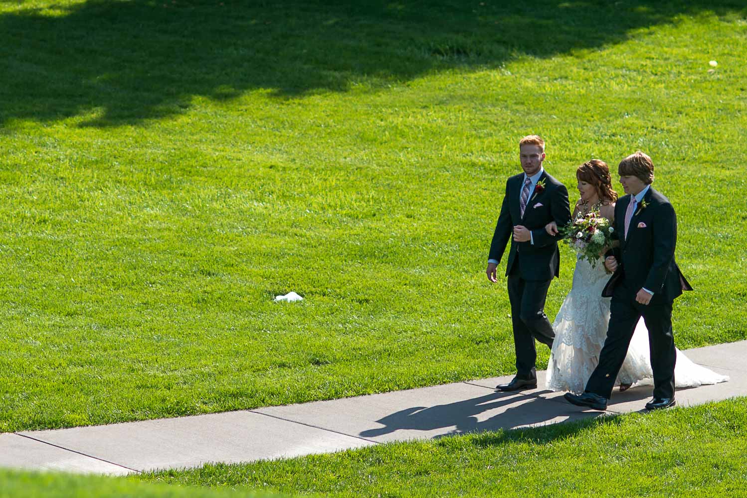 bride walking at Gold Medal Park to her ceremony