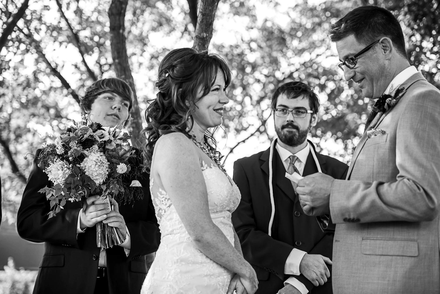 bride and groom exchanging vows in Minneapolis at Gold Medal Park