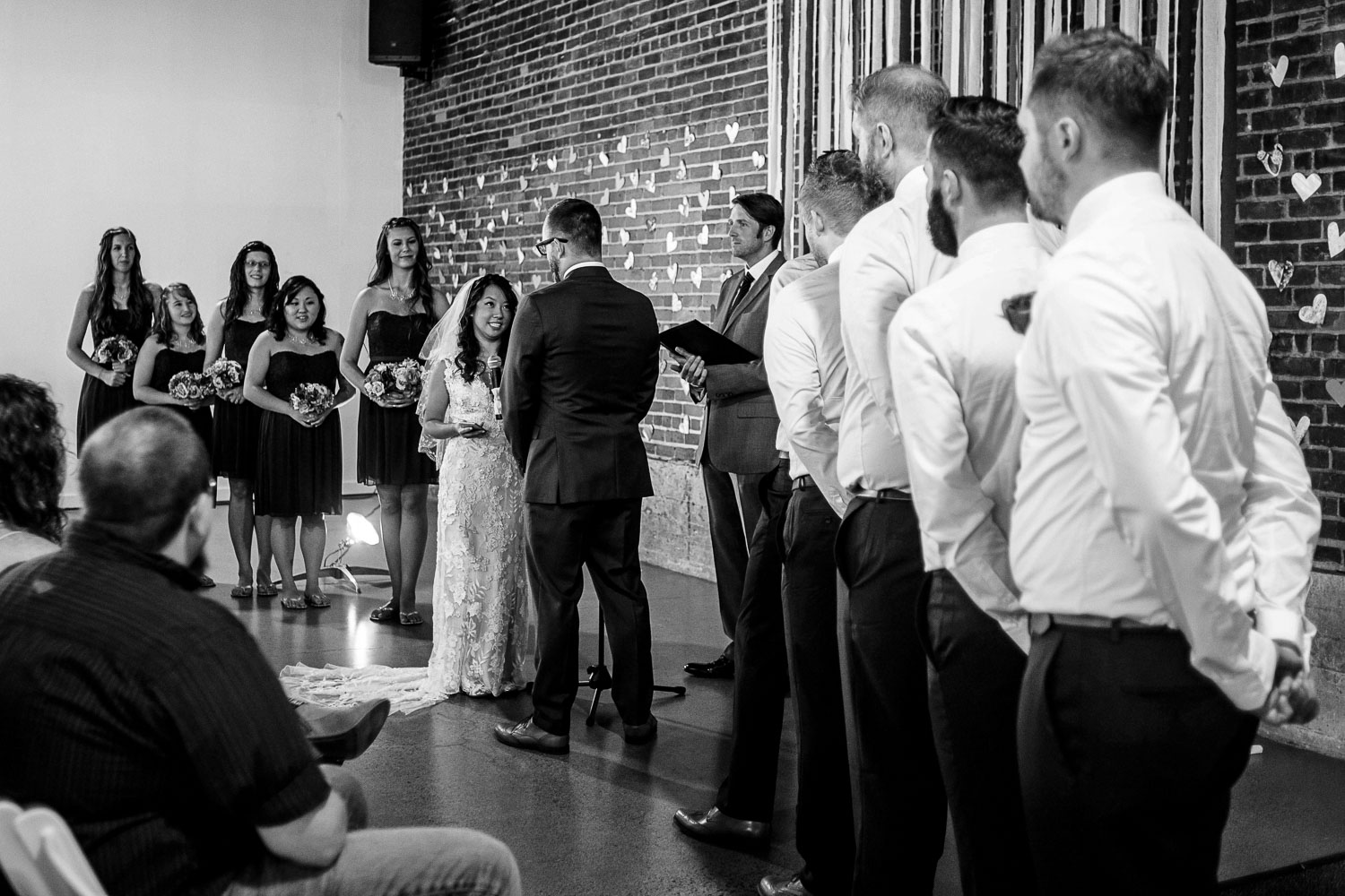 bride and groom exchanging vows during their Minneapolis wedding ceremony