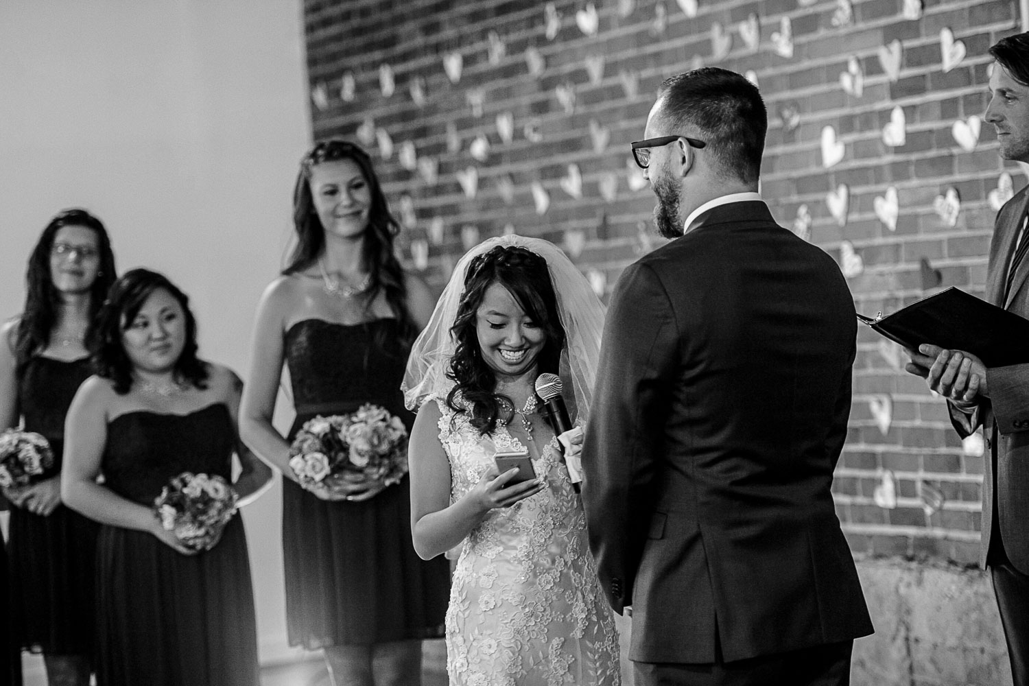 bride reading her vows to the groom during their wedding ceremony