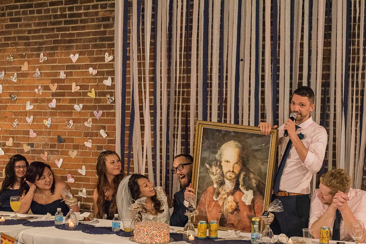 best man gave the groom a portrait of himself for a wedding gift