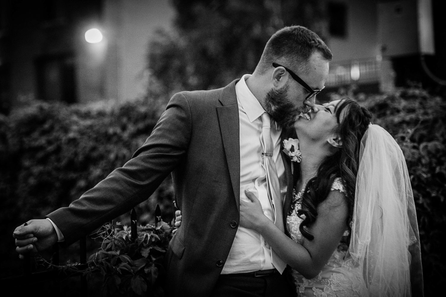 bride and groom kissing outside of their Minneapolis North Loop venue